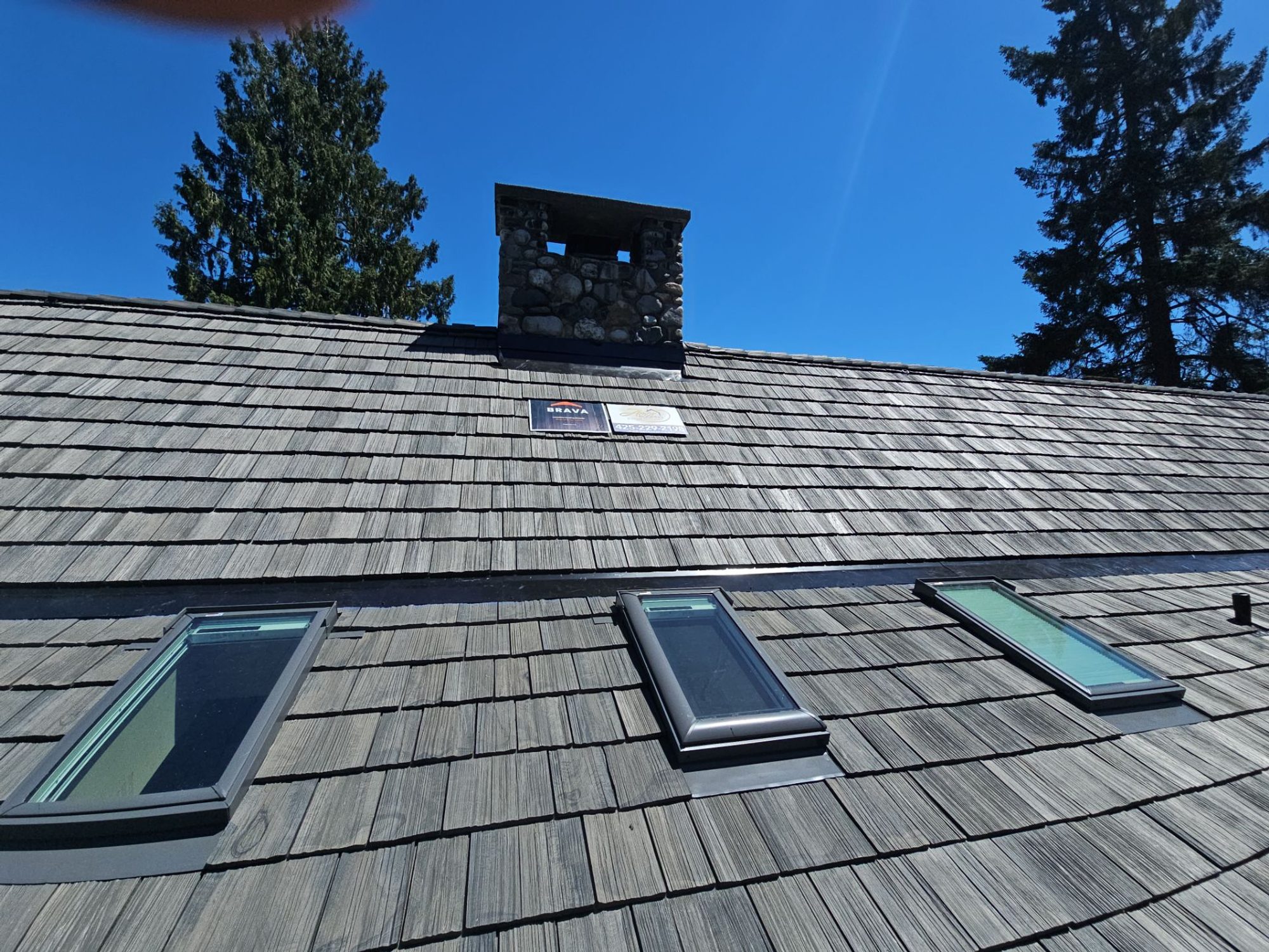 Amor Roofing Canyon Gray composite roof in Stanwood, skylight row detail