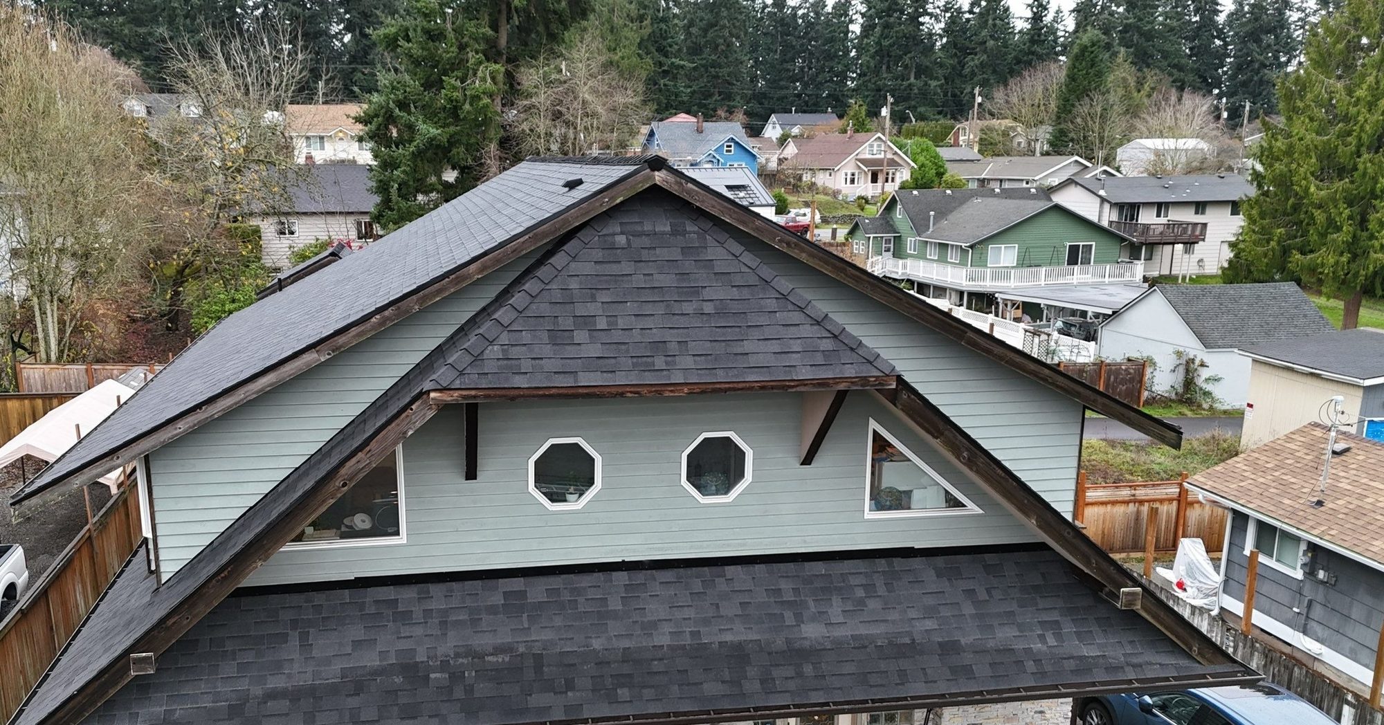 Drone view of the finished Malarkey Midnight Black asphalt shingle roof, Everett, WA, by Amor Roofing