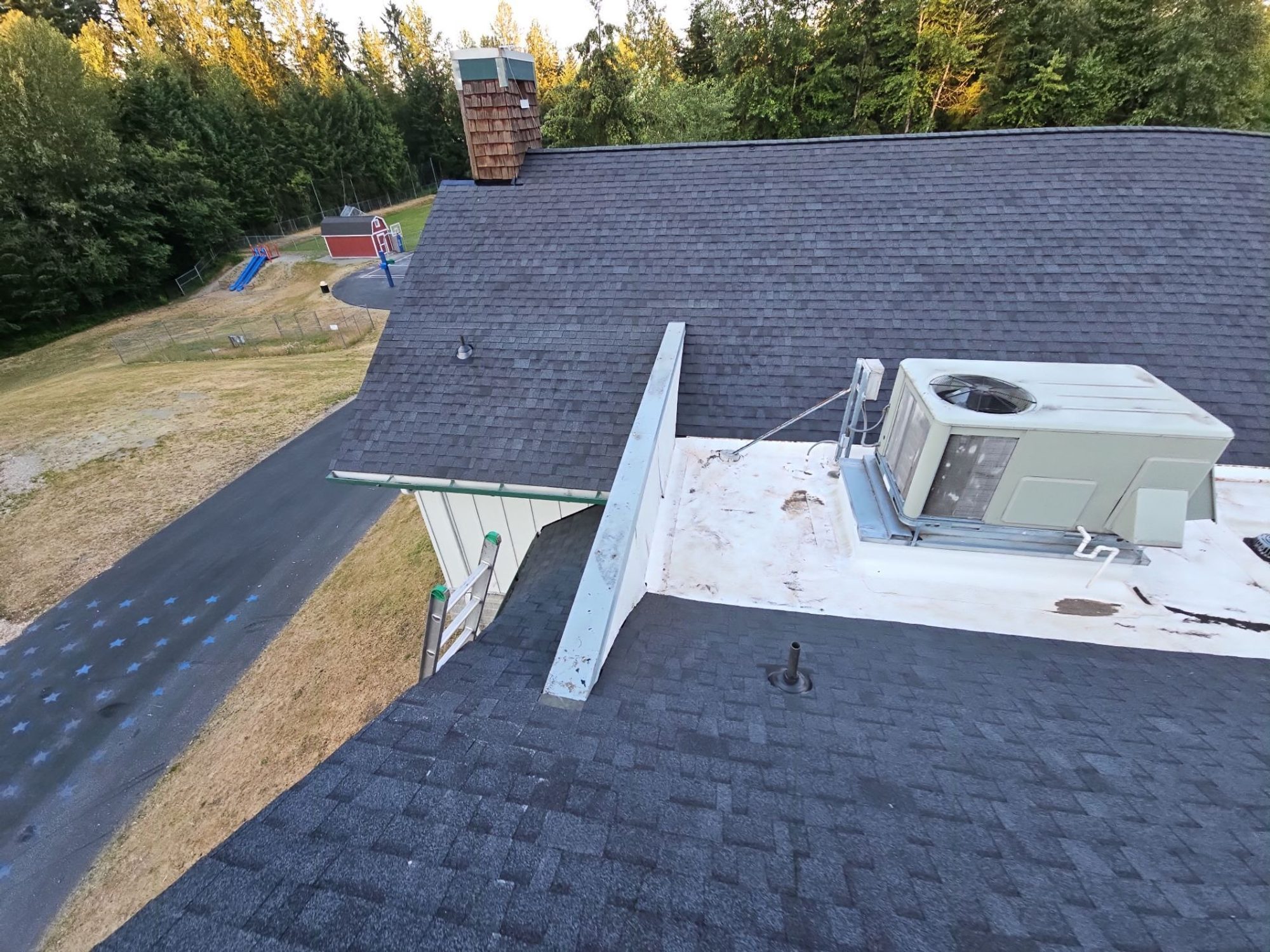 Amor Roofing Antique Black asphalt roof in Woodinville, a hero