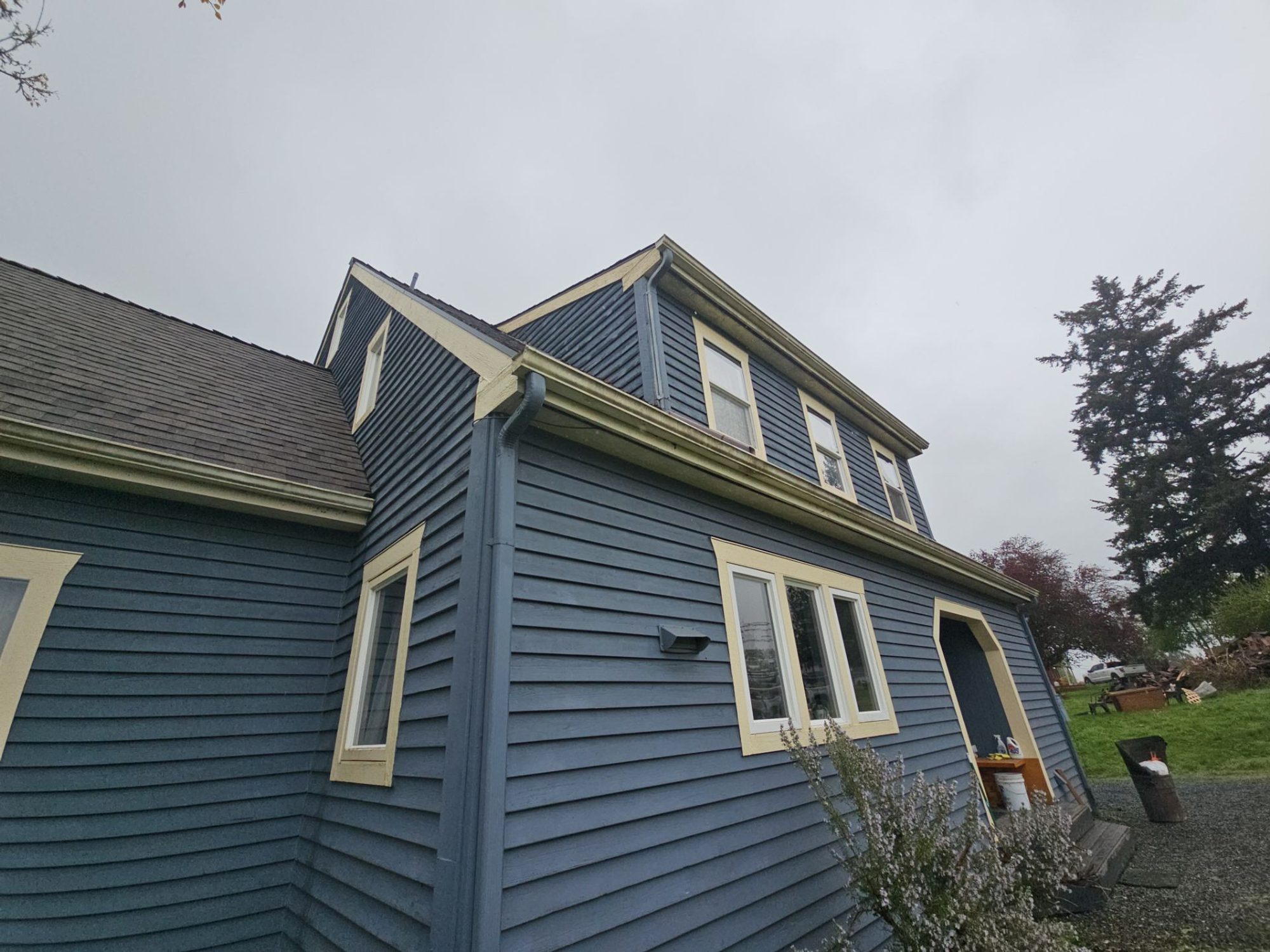Dormers and the finished Malarkey Vista Natural Wood asphalt shingle roof on the main house, Snohomish, WA