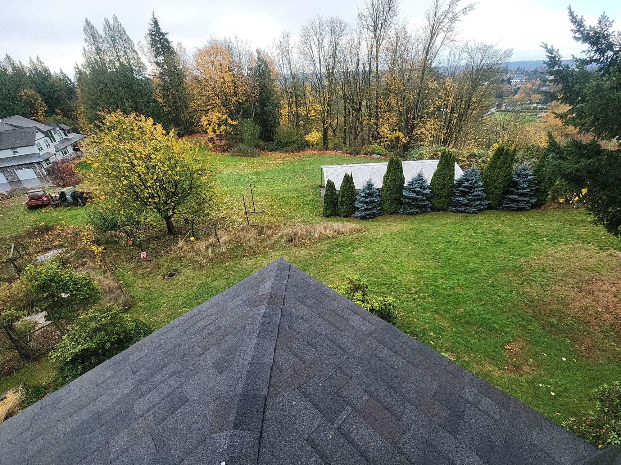 Finished Malarkey Vista Black Oak asphalt shingle roof from the ridge, Snohomish, WA
