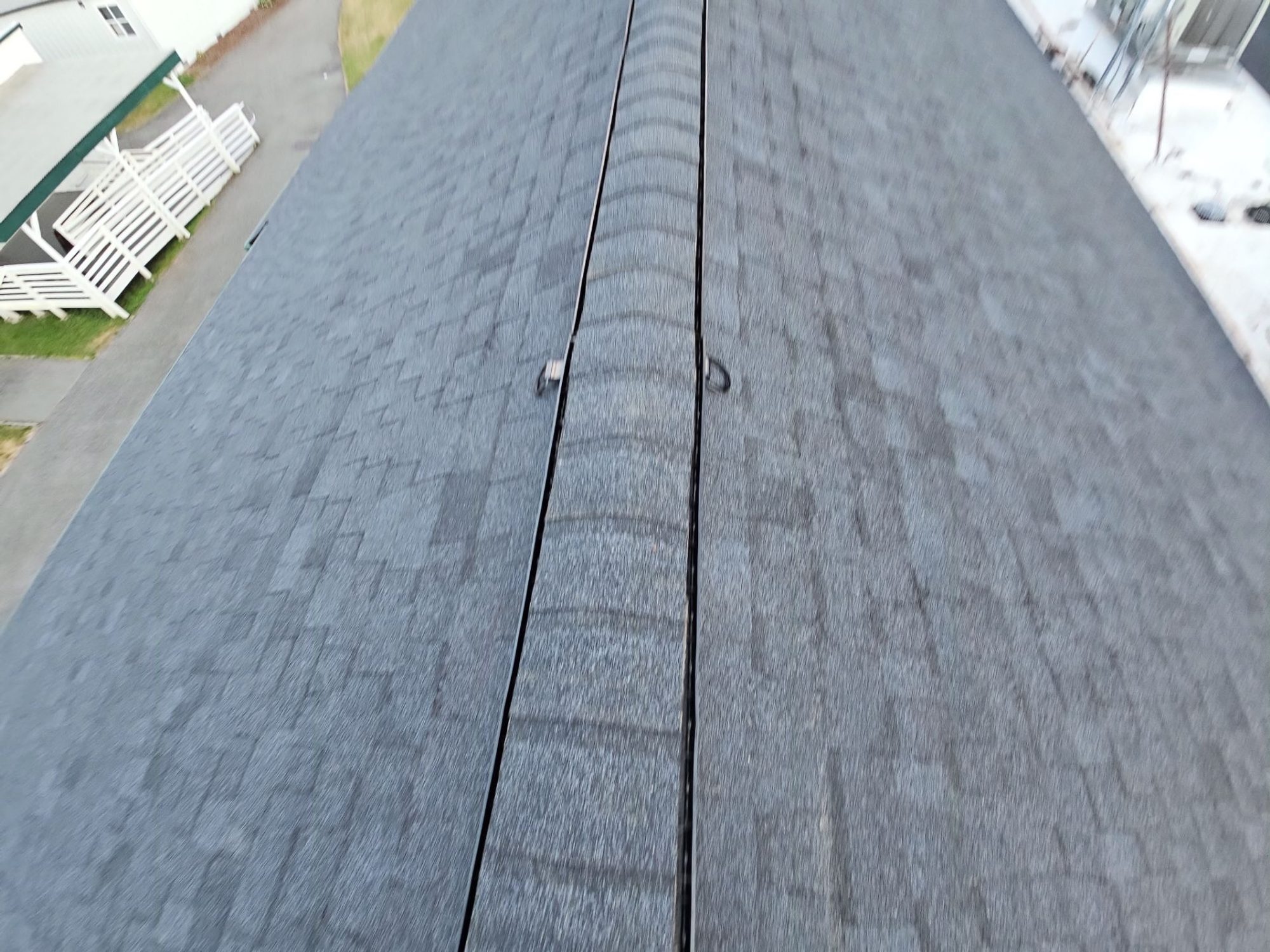 Amor Roofing Antique Black asphalt roof in Woodinville, a 00