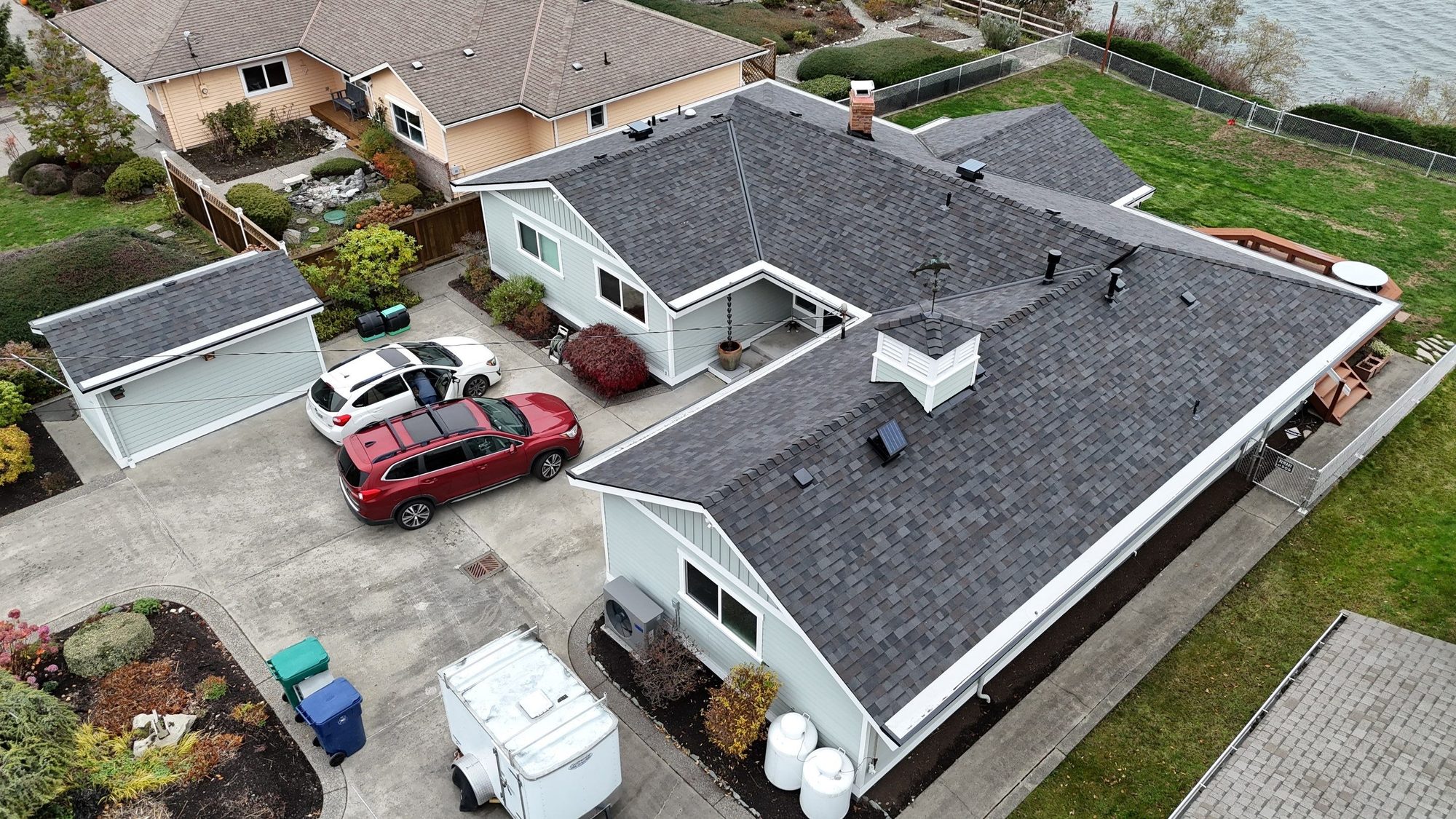 Amor Roofing Black Oak asphalt roof in Camano Island, drone full property
