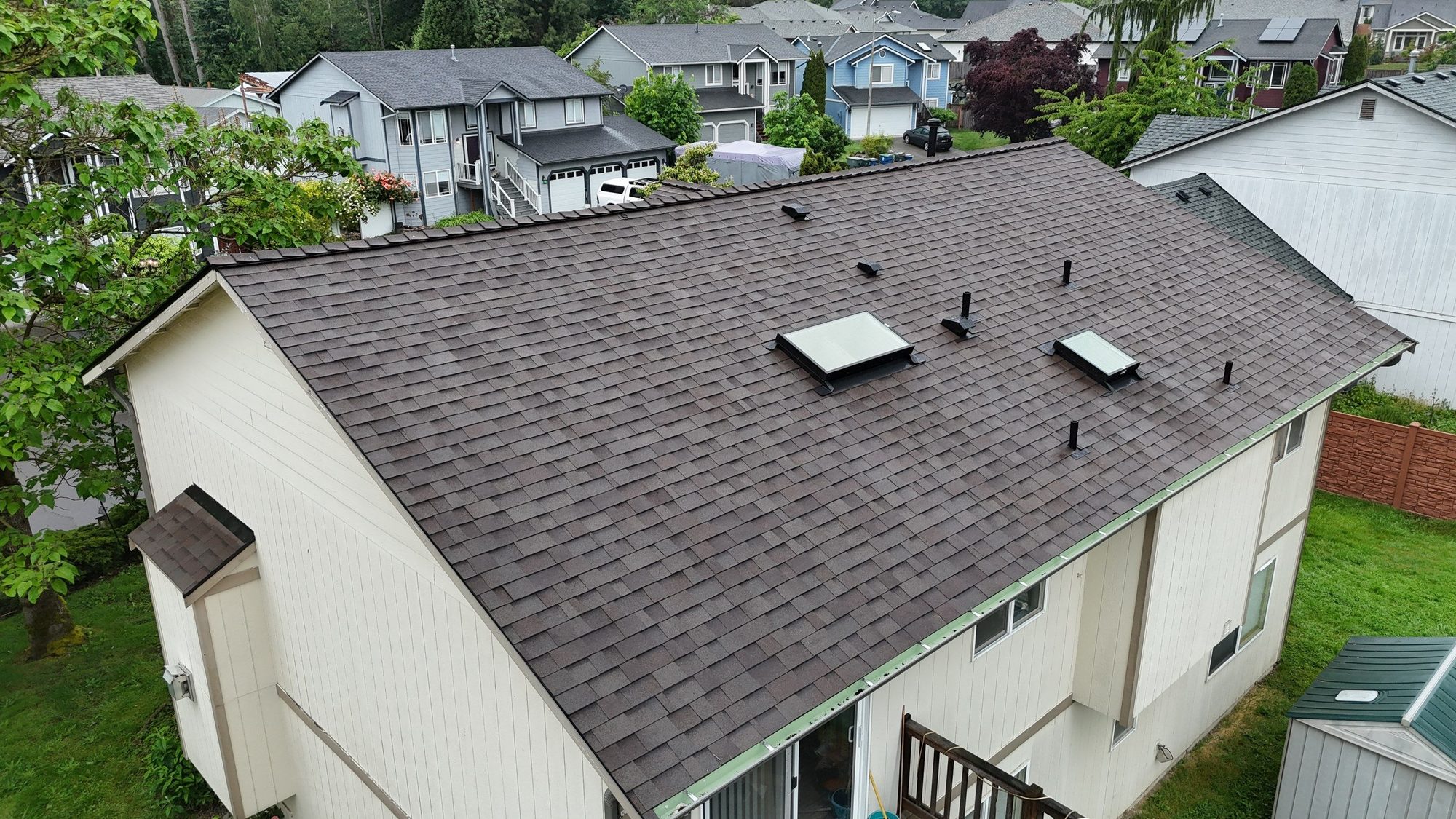 Amor Roofing Heather asphalt roof in Snohomish, skylights deck aerial