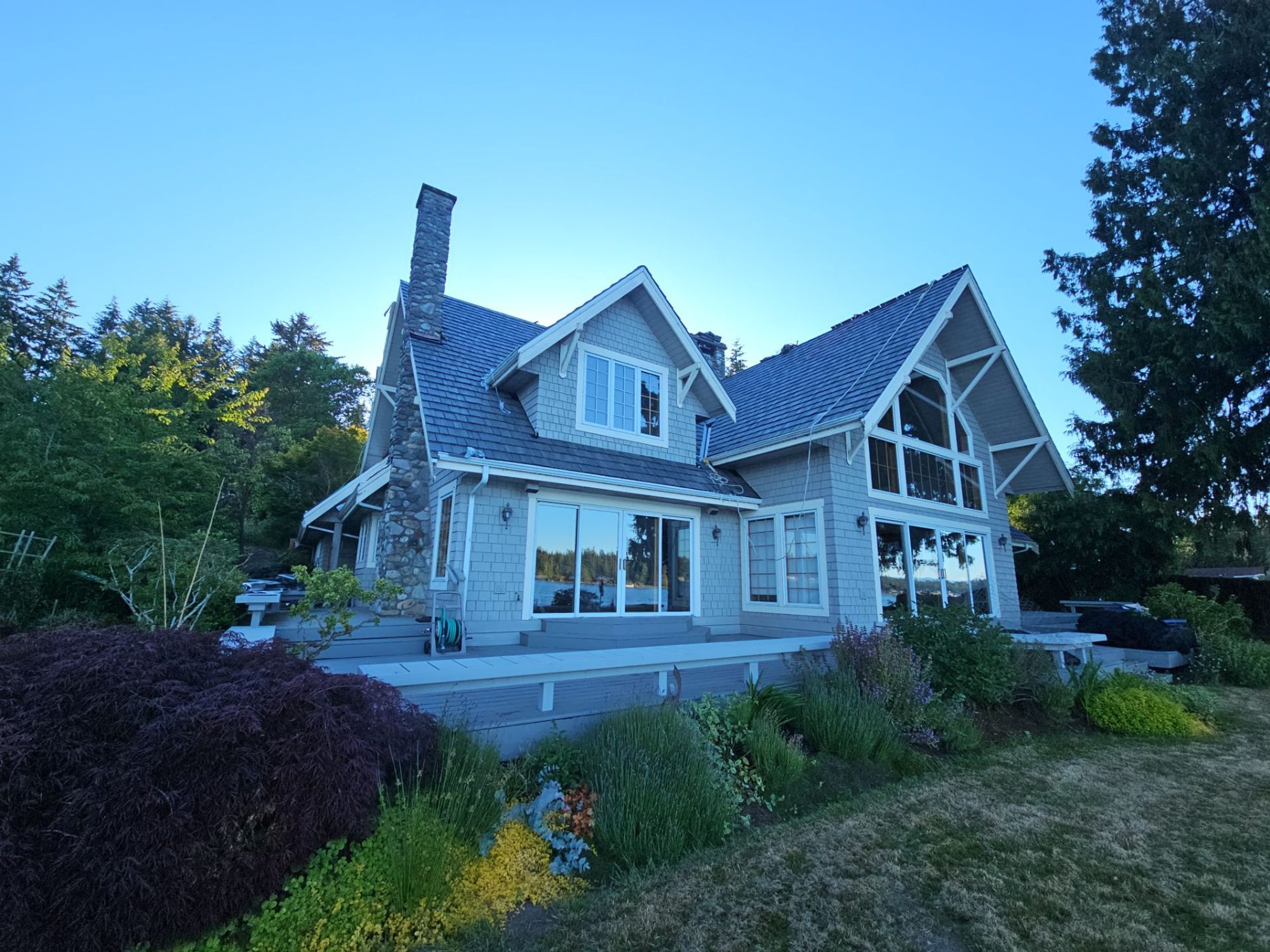 Amor Roofing Canyon Gray composite roof in Stanwood, full property dusk