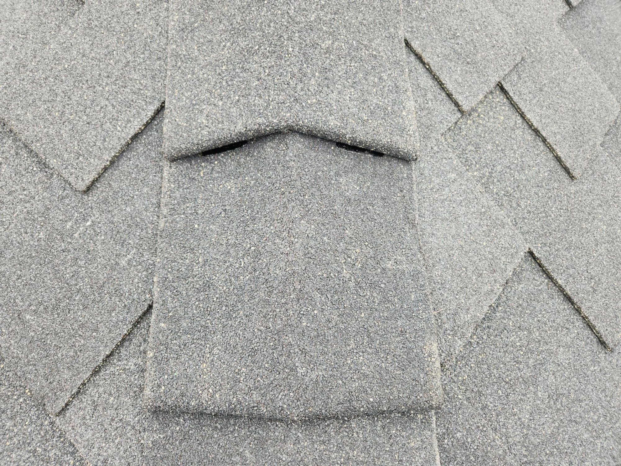 Ridge cap close-up on the Midnight Black designer shake roof, Brier, WA