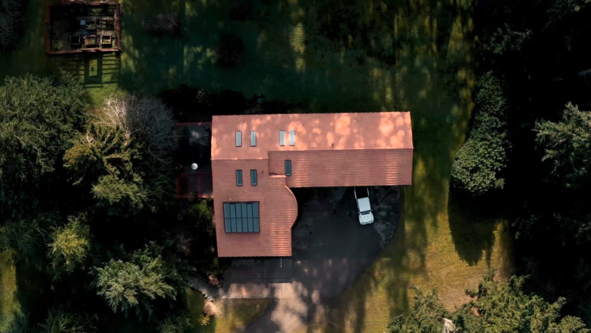 Top-down drone view of the completed Antique Clay Brava composite Spanish barrel tile roof, Camano Island, WA