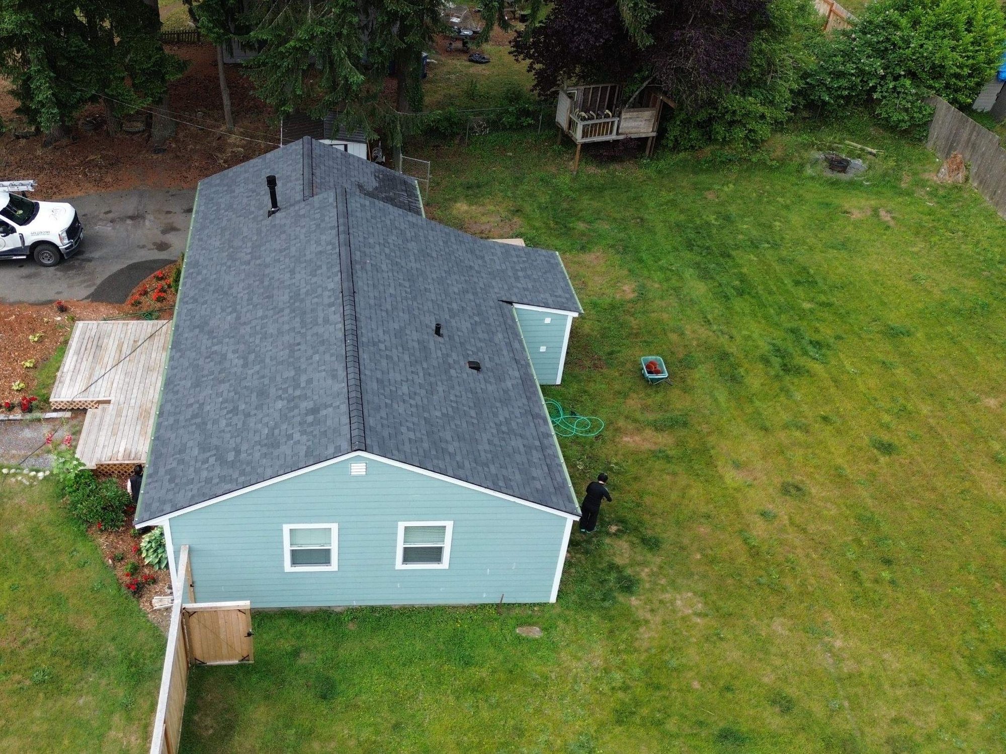 Drone view of the finished Malarkey Legacy Midnight Black asphalt shingle roof, Edmonds, WA, by Amor Roofing