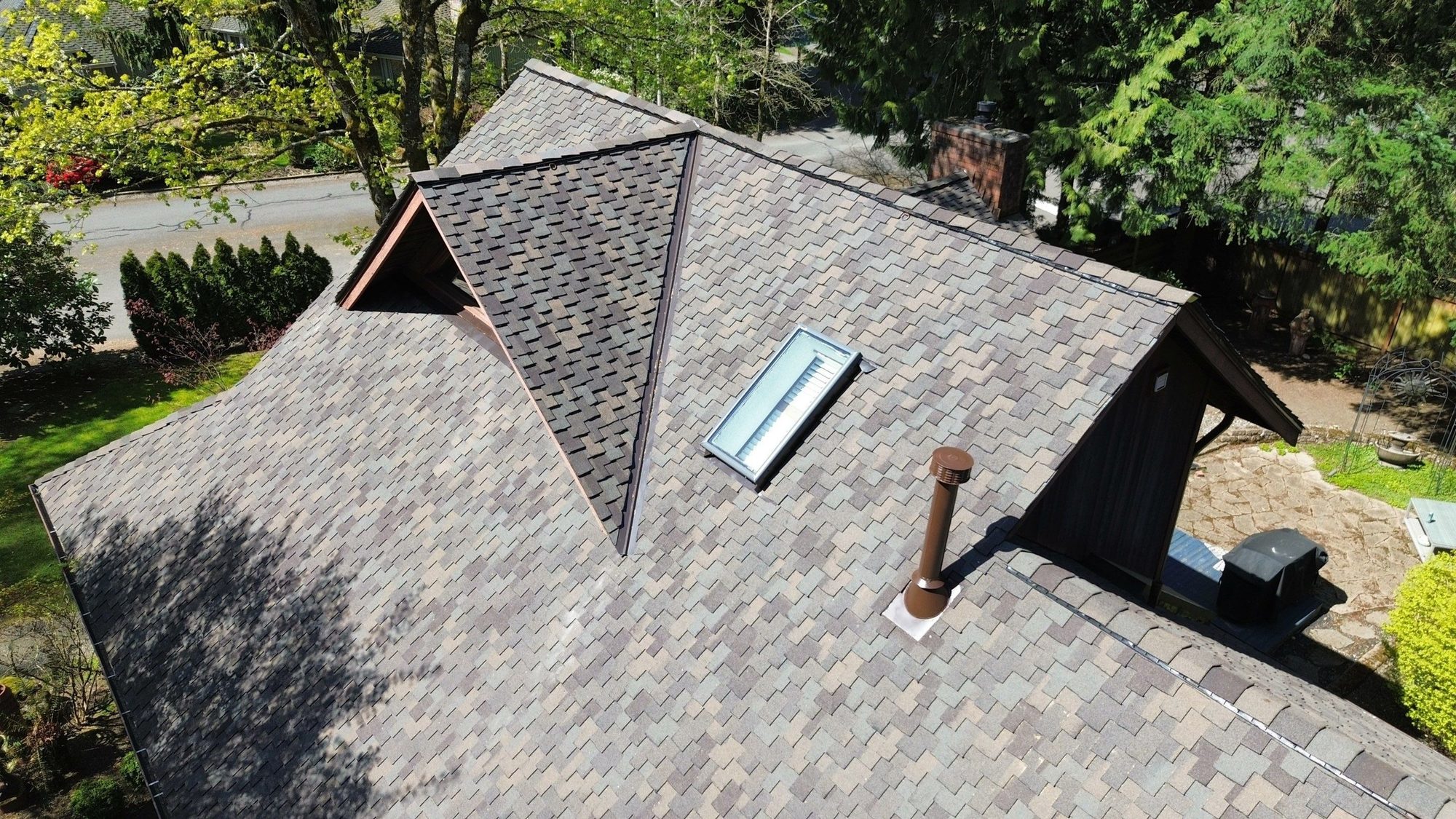 Drone view of the finished Presidential Shake Autumn Blend roof, Mill Creek, WA, by Amor Roofing