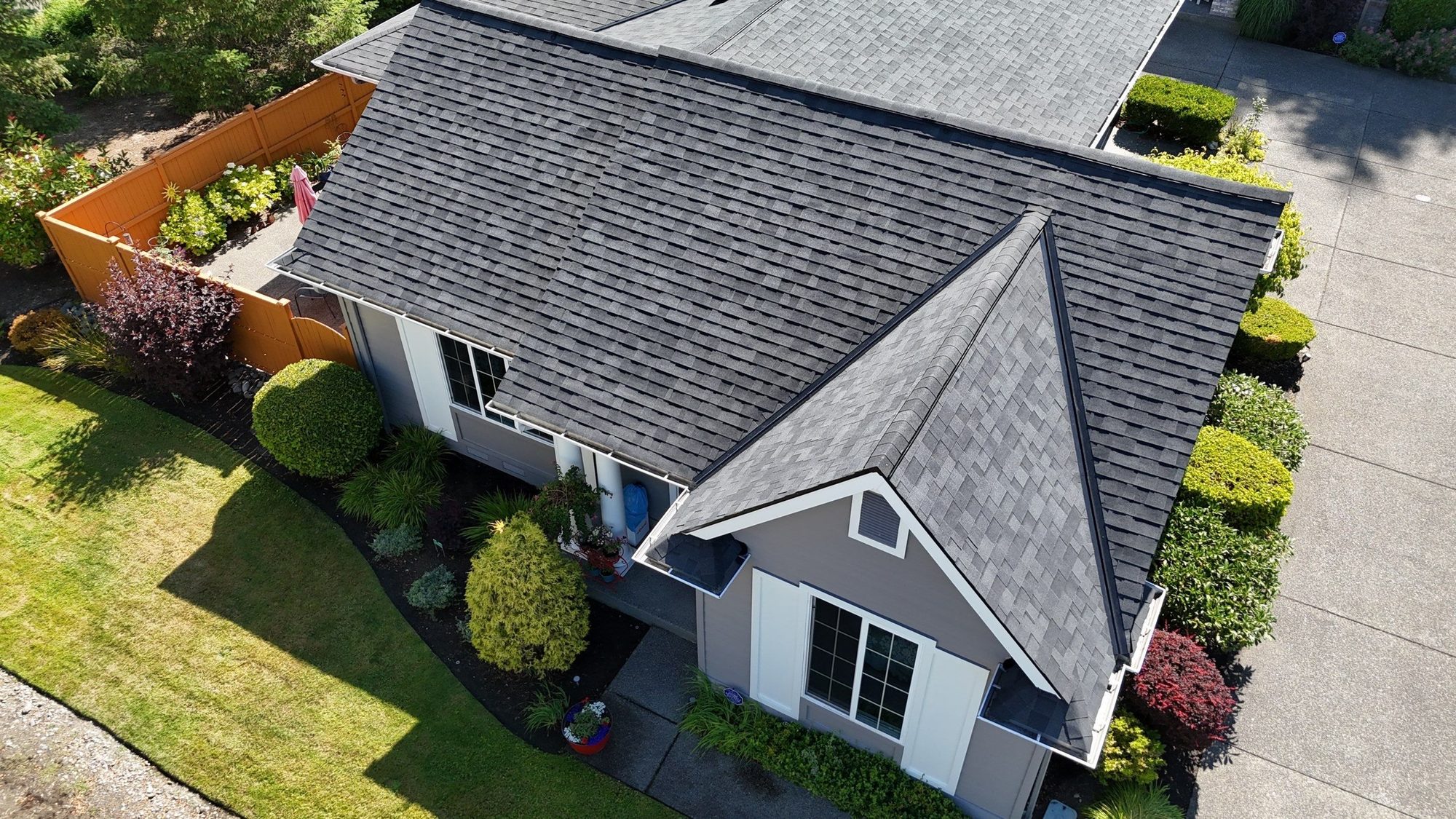 Drone view of the completed Malarkey Highlander Midnight Black asphalt shingle roof on a Redmond, WA home by Amor Roofing