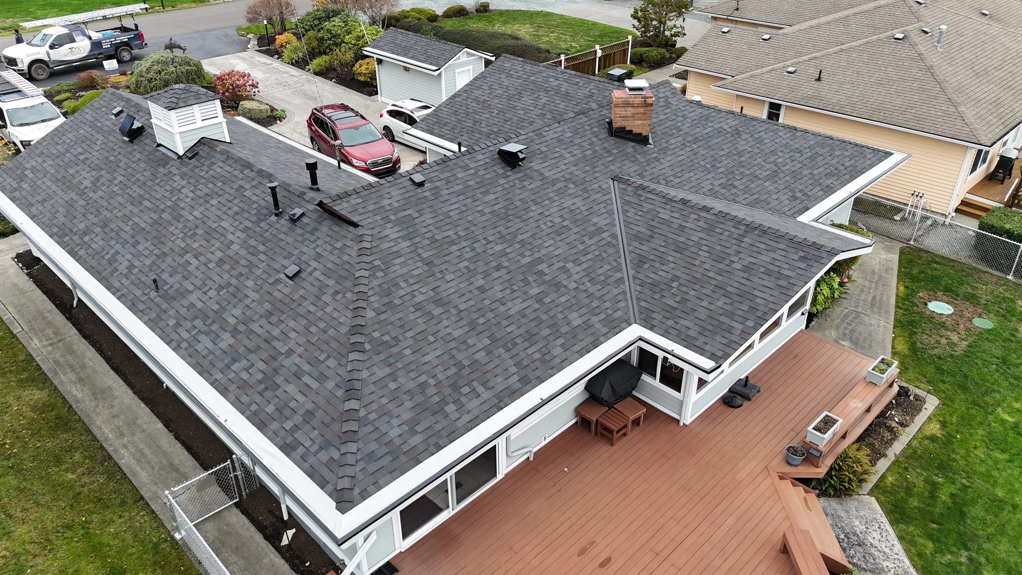 Amor Roofing Black Oak asphalt roof in Camano Island, drone roof over deck