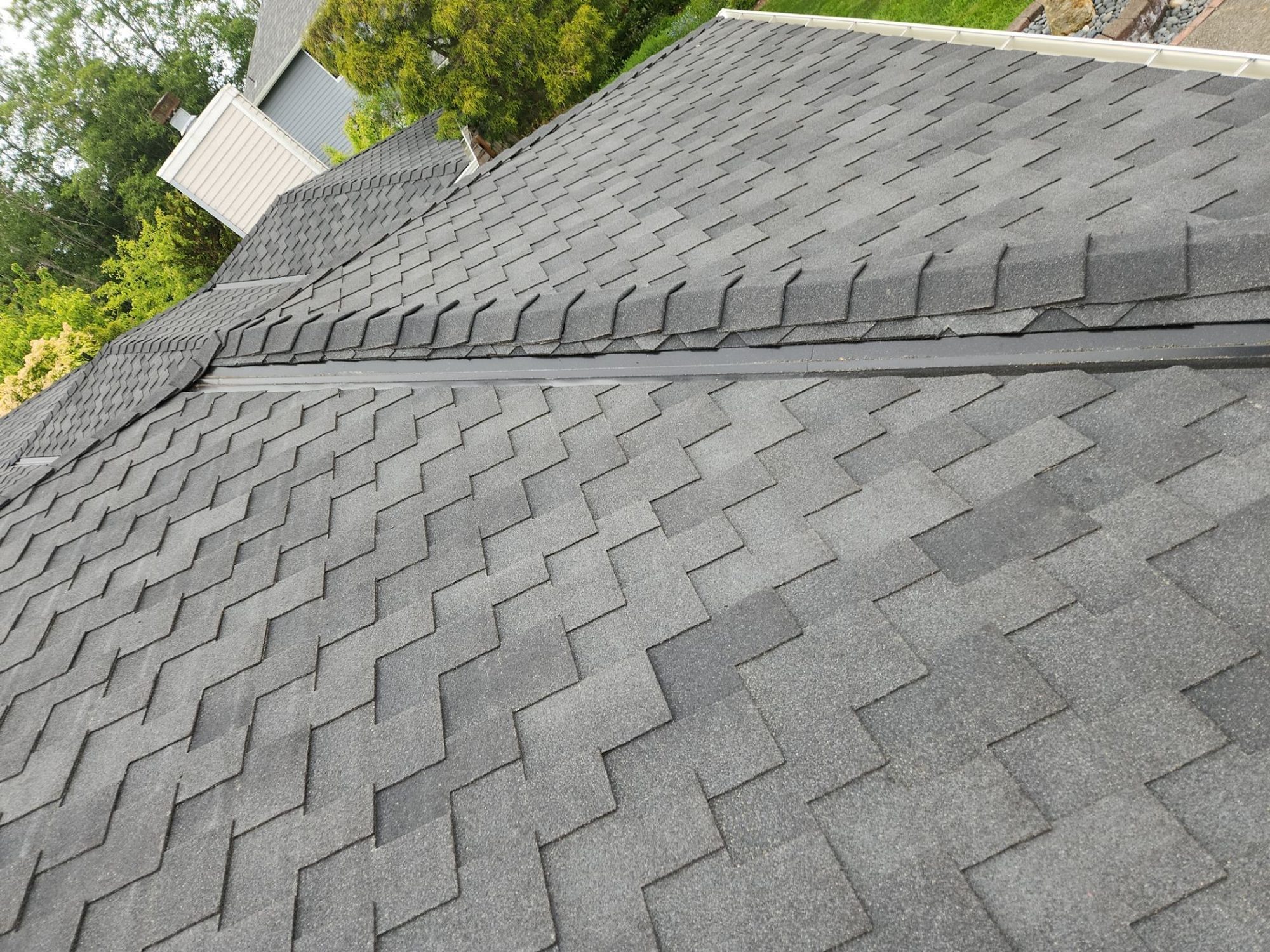 Shingle field texture of the Midnight Black designer shake roof, Brier, WA
