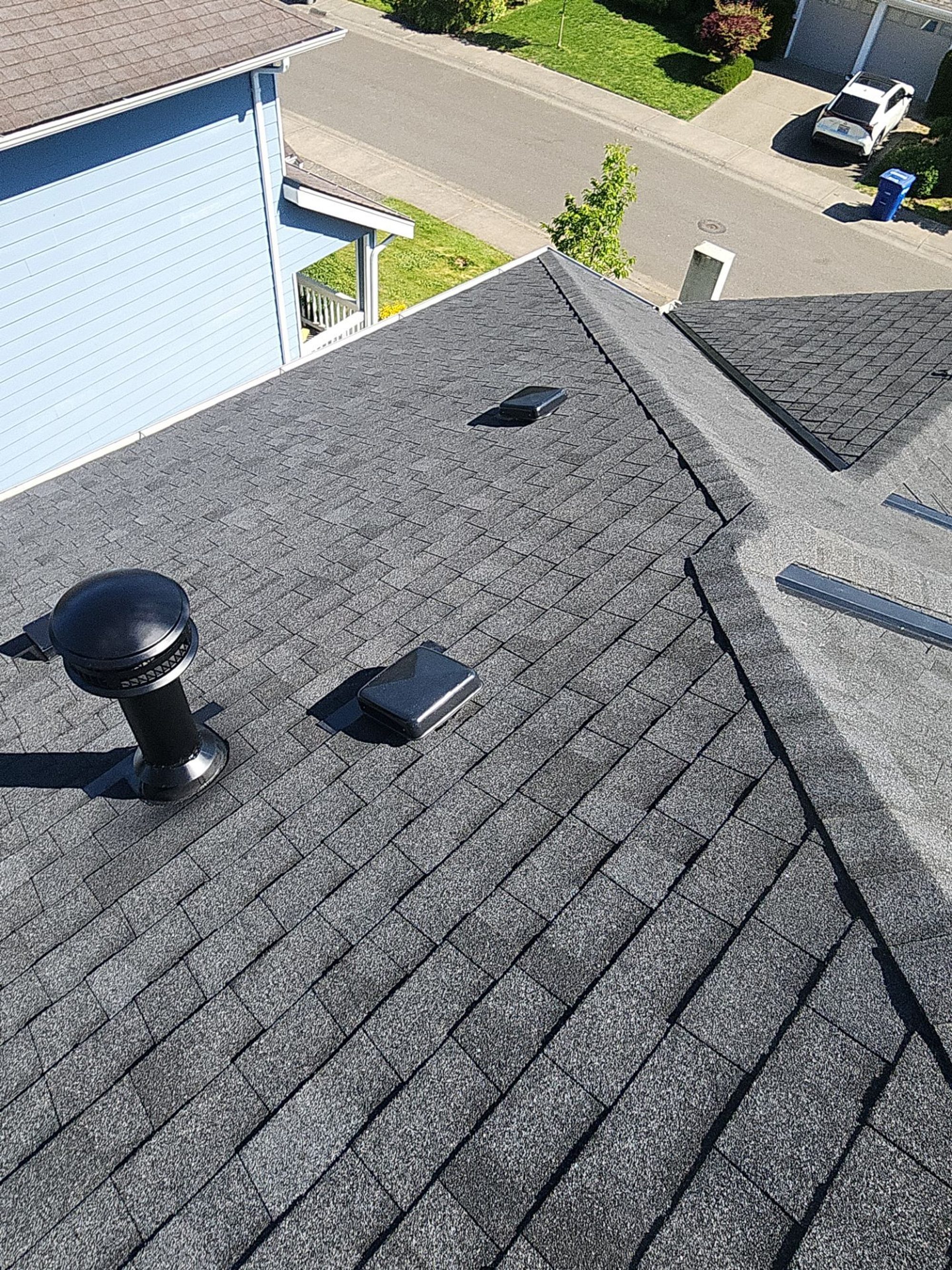 Amor Roofing Antique Black asphalt roof in Bothell, aerial finished roof