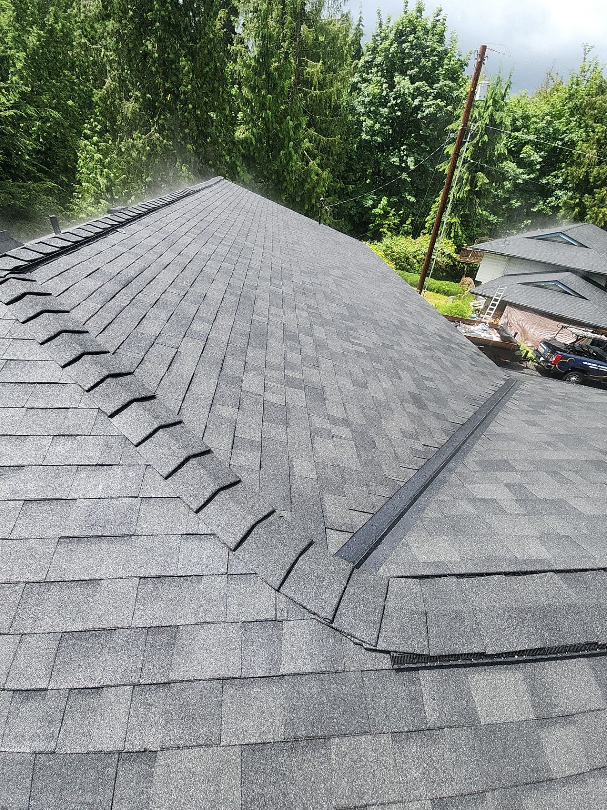Amor Roofing Midnight Black asphalt roof in Lake Stevens, after roof ridge hips