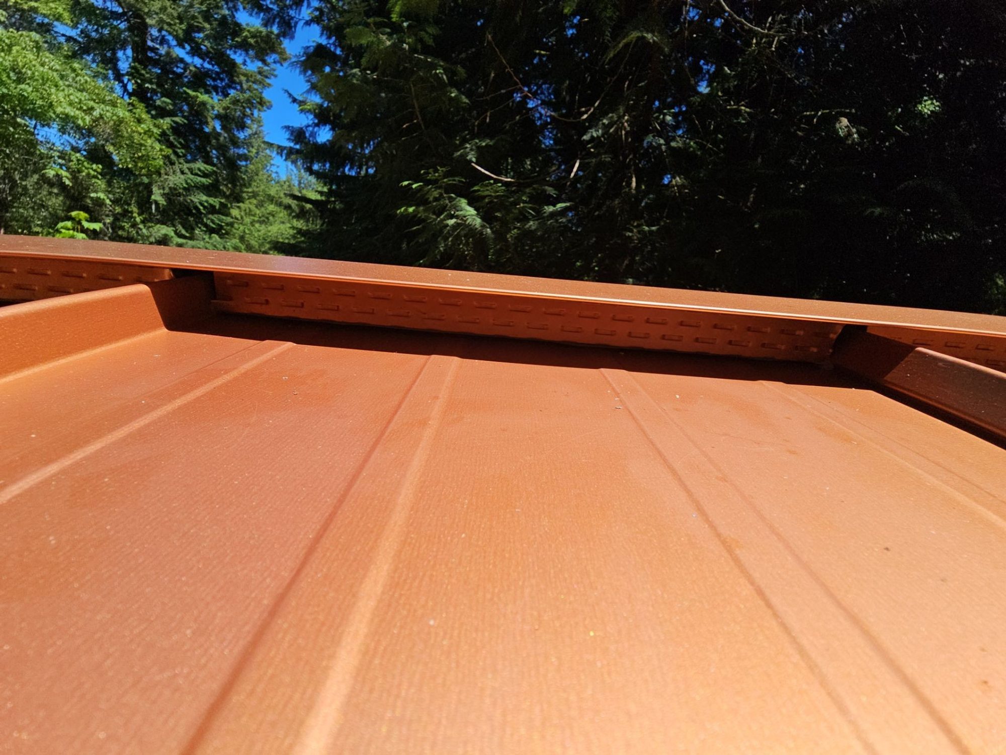 Ridge cap detail on the Copper Penny standing seam metal roof, Marysville, WA