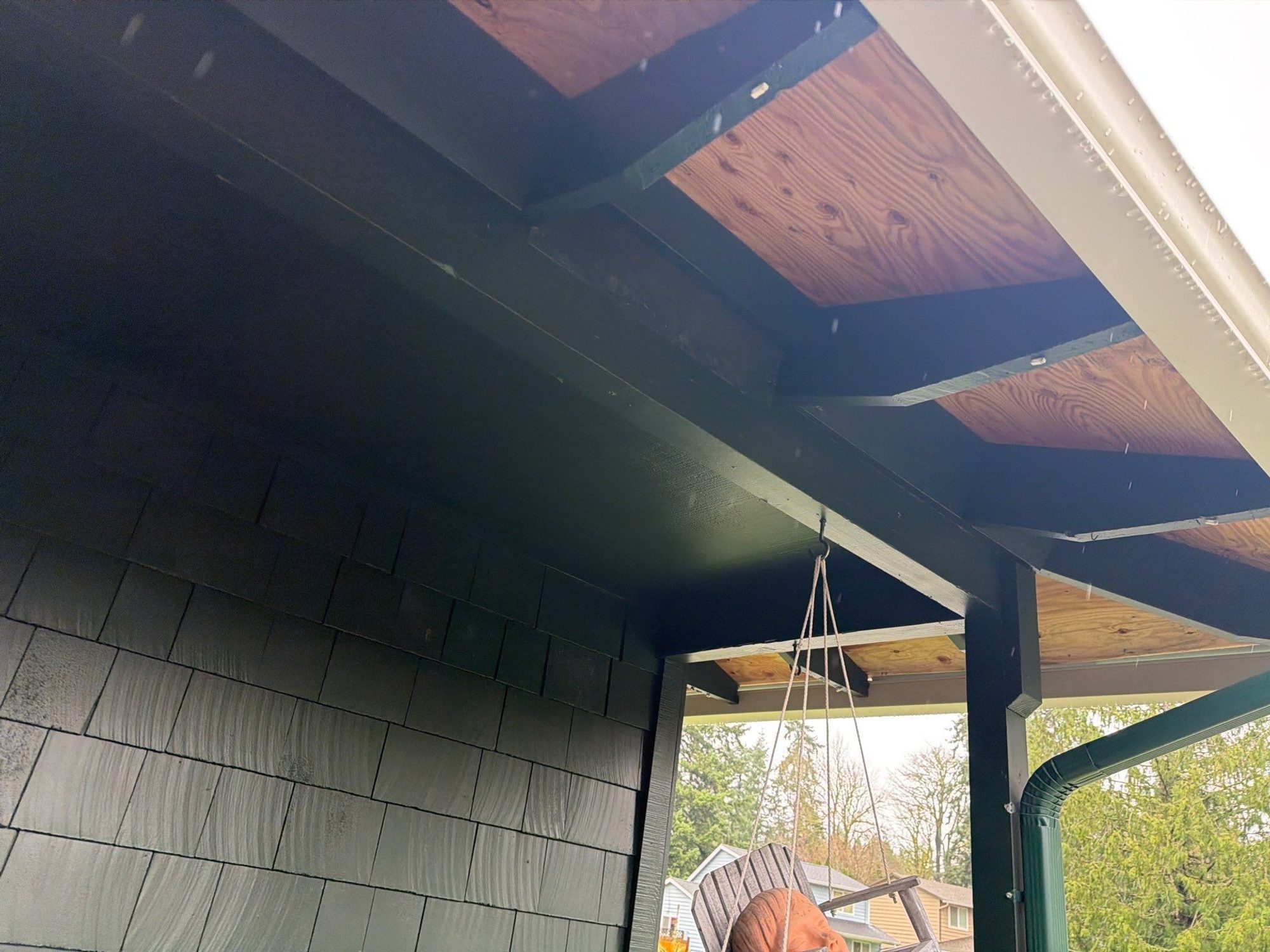 Roof plane detail showing Cascade Gray standing seam metal pattern in Woodinville, WA