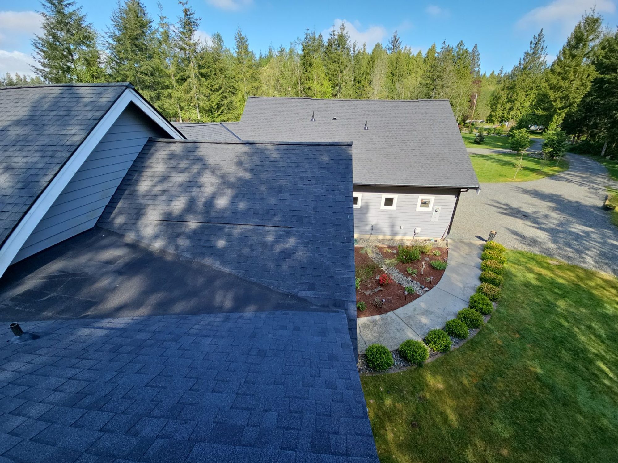 View down the finished roof toward the front walkway and landscaping, Lake Stevens, WA