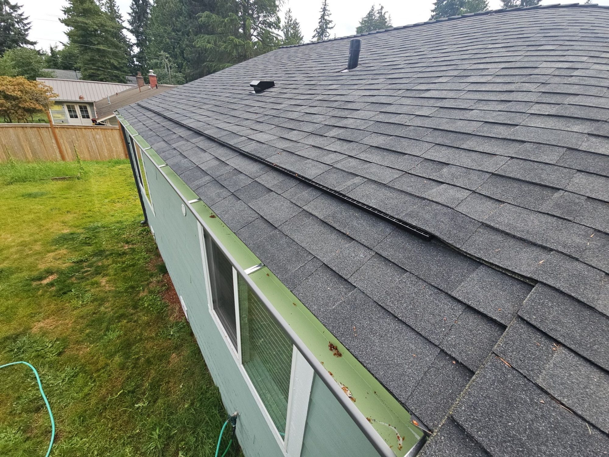 Amor Roofing Midnight Black asphalt roof in Edmonds, a aerial roof