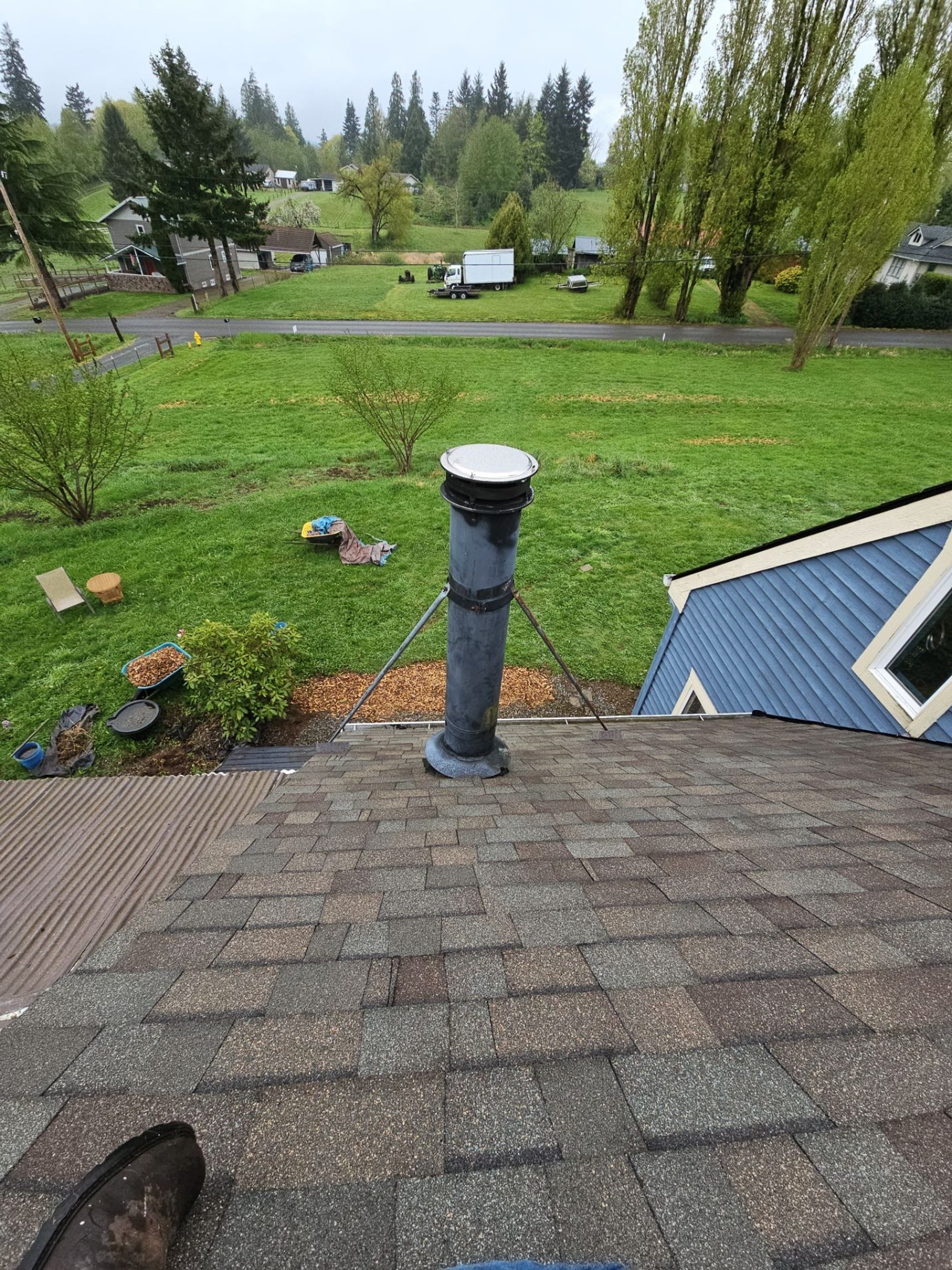 Pipe vent and dormer on the finished Malarkey Vista Natural Wood asphalt shingle roof, Snohomish, WA