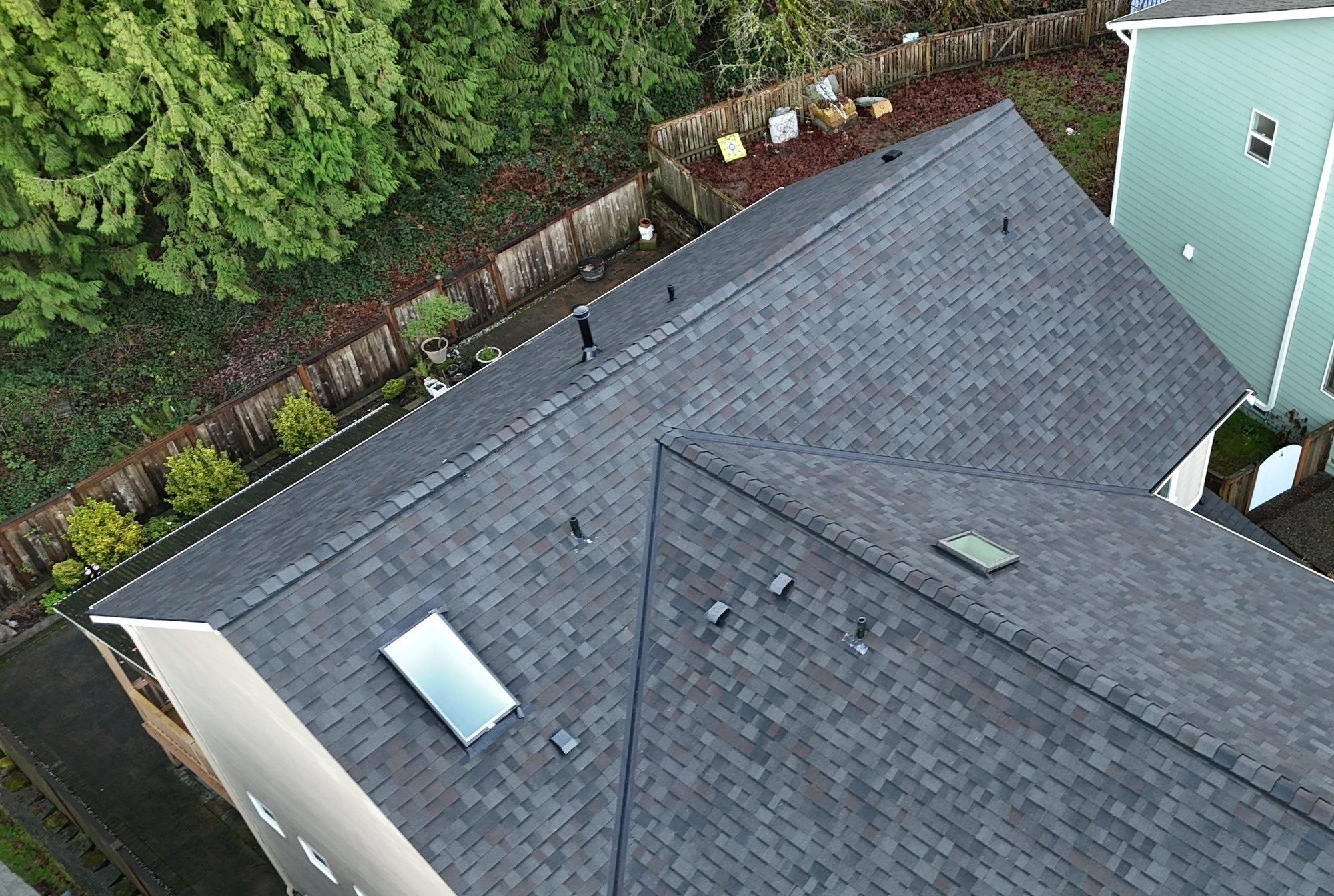Aerial of the finished Malarkey Vista Black Oak asphalt shingle roof over the whole home, Snohomish, WA