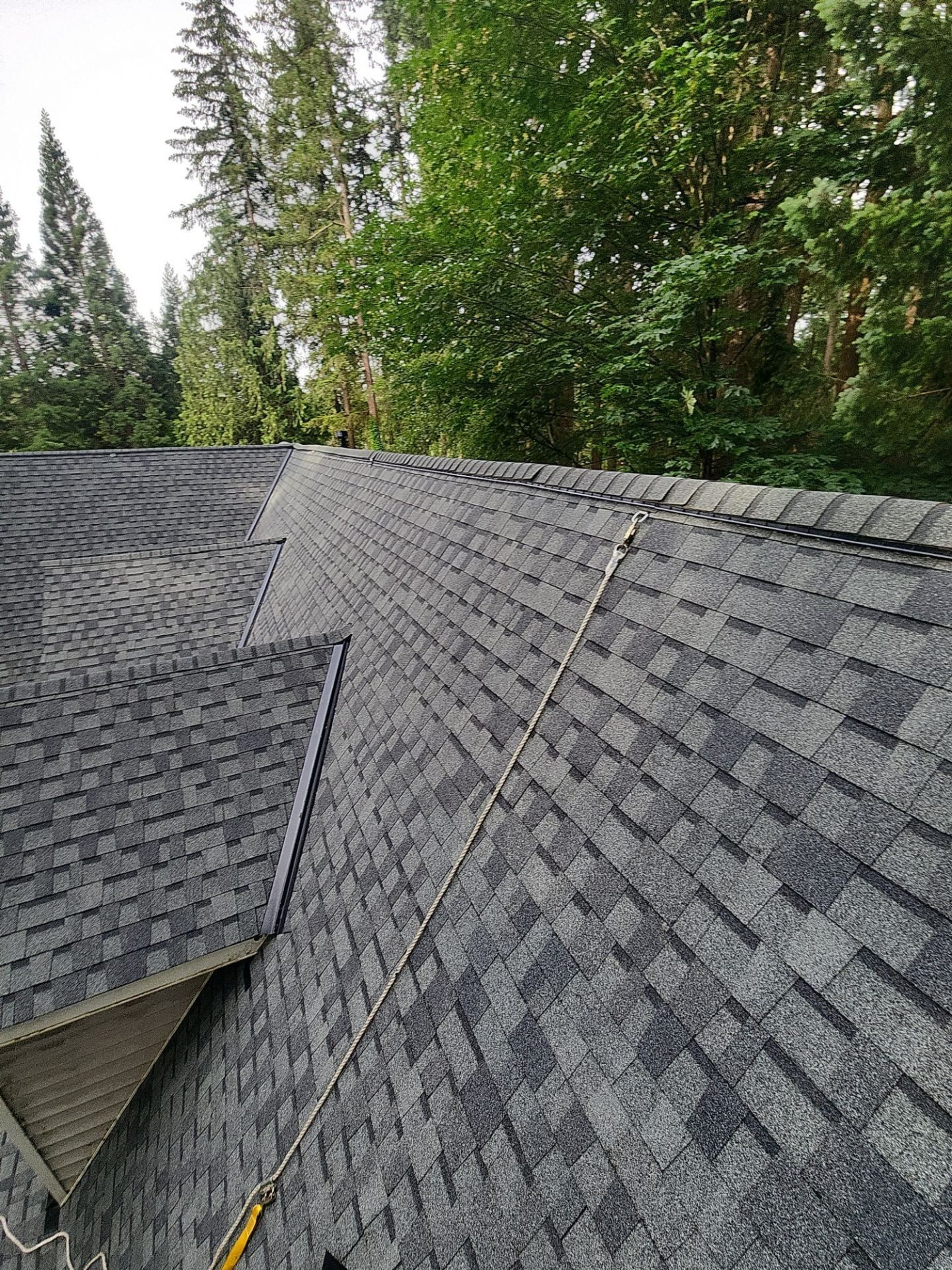 Dormer on the finished Pabco Premier Pewter Gray asphalt shingle roof from above, Lake Stevens, WA