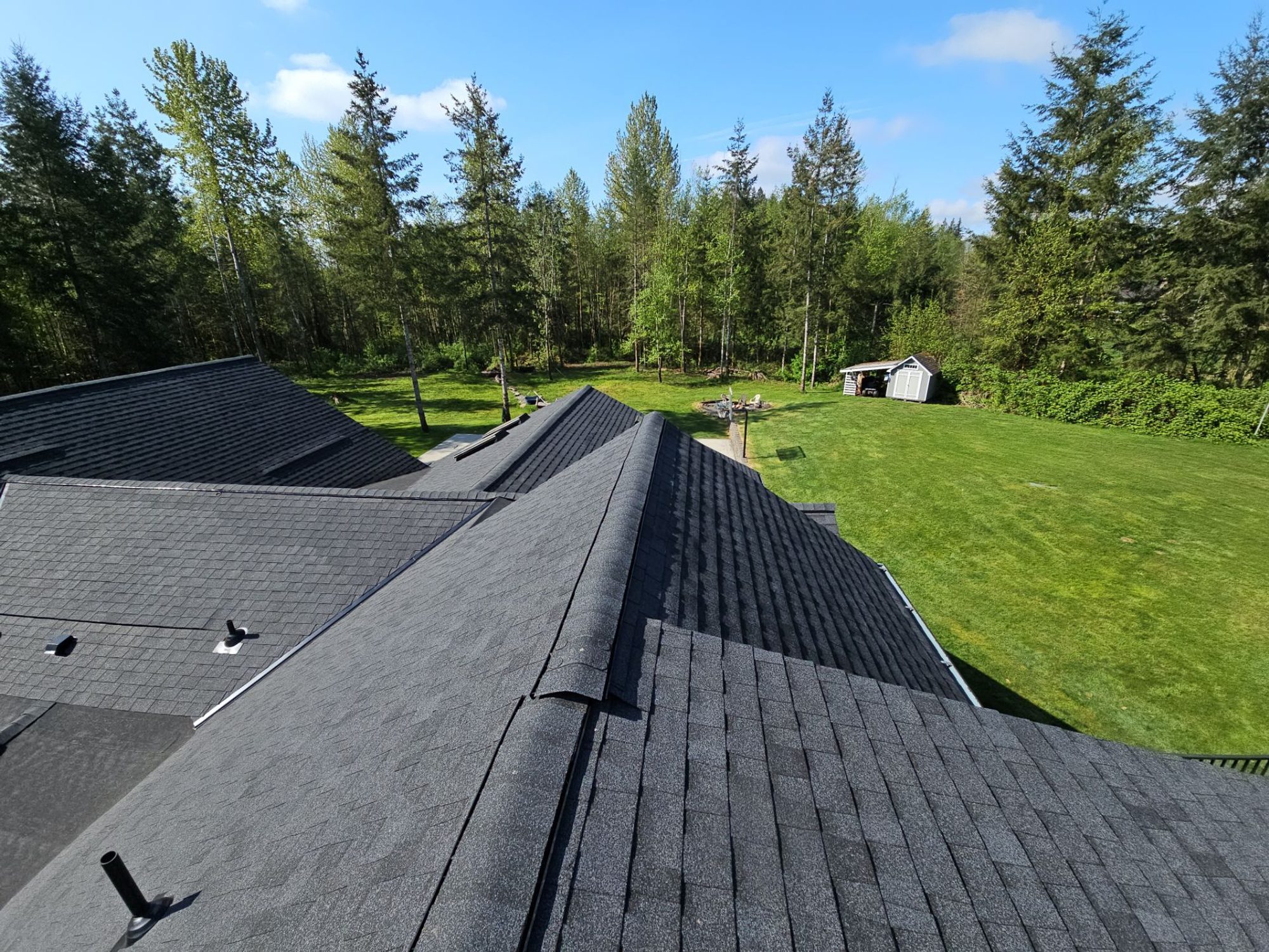 Finished asphalt roofline looking out over the property, Lake Stevens, WA