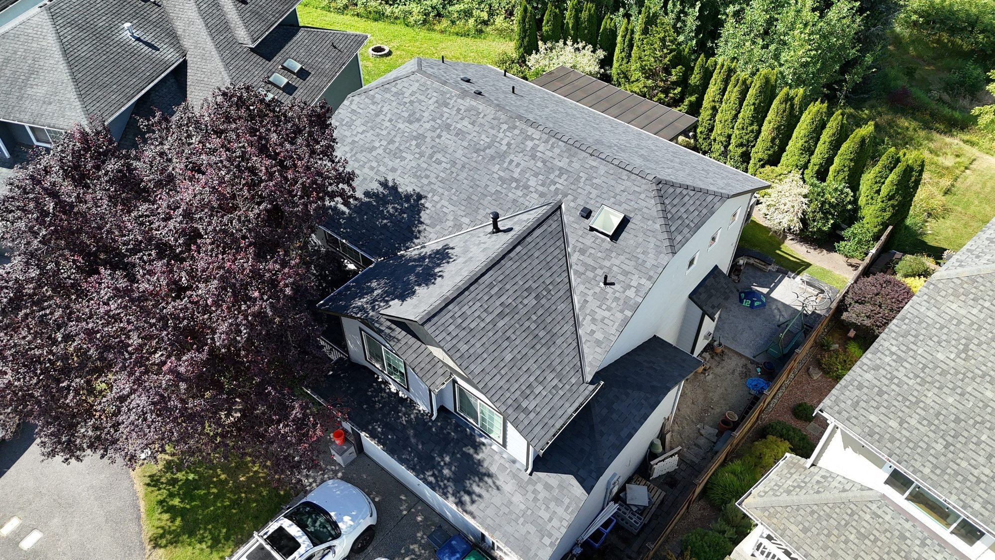 Amor Roofing Midnight Black asphalt roof in Marysville, aerial home