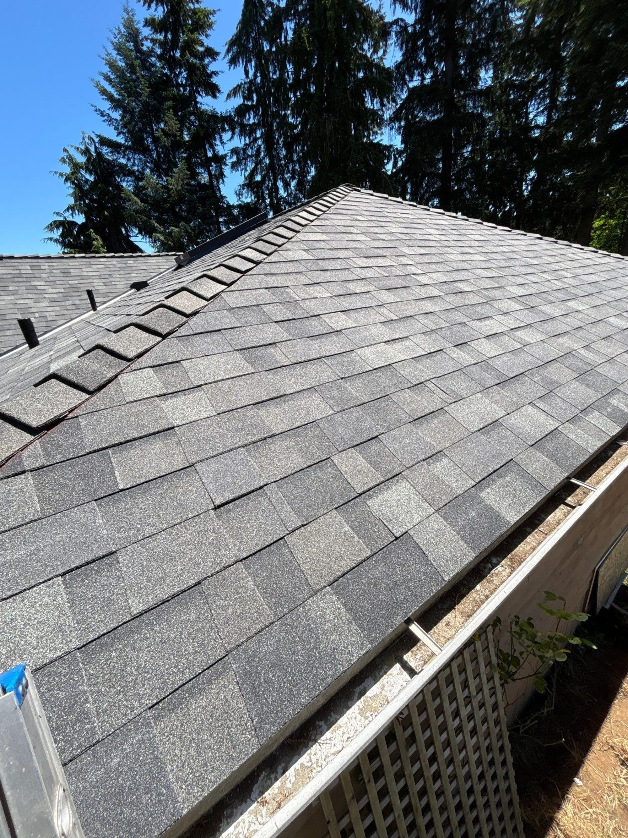 Finished Malarkey Storm Grey asphalt shingle roof over the garage corner, Lake Stevens, WA