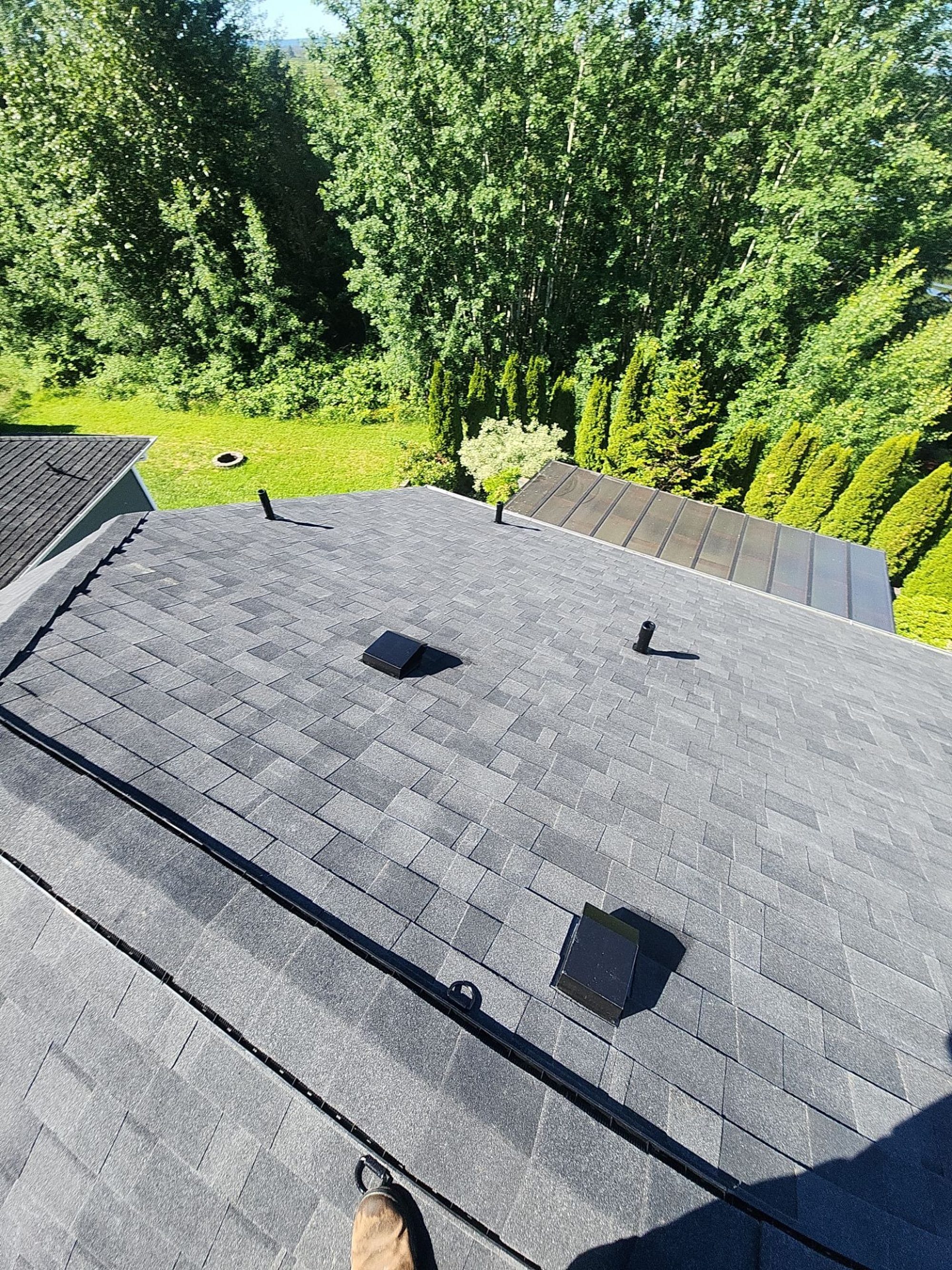 Amor Roofing Midnight Black asphalt roof in Marysville, roof wide