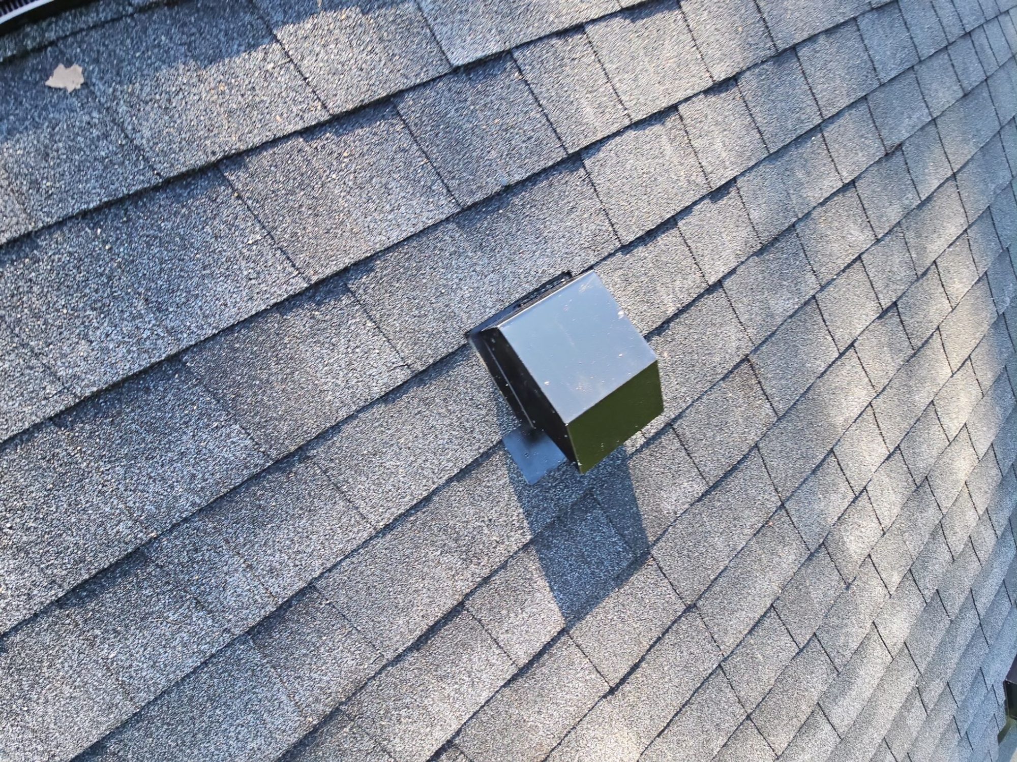 Roof vent detail on the Antique Black asphalt shingle roof, Tulalip Bay, WA