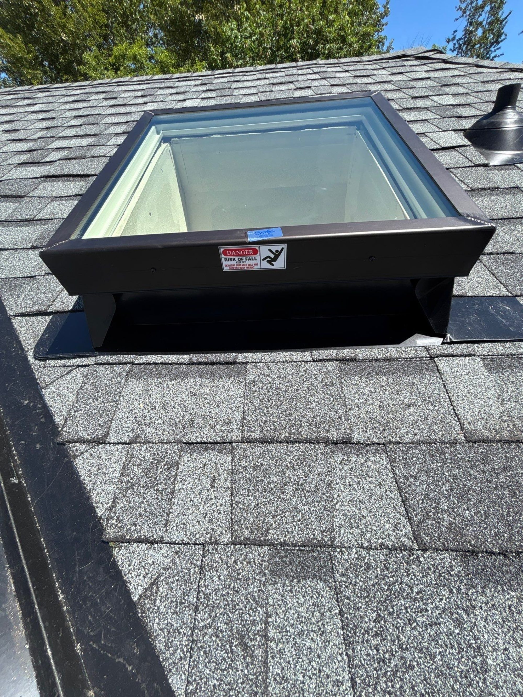 Finished skylight flashed into the Pabco Premier Pewter Gray asphalt shingle roof, Marysville, WA