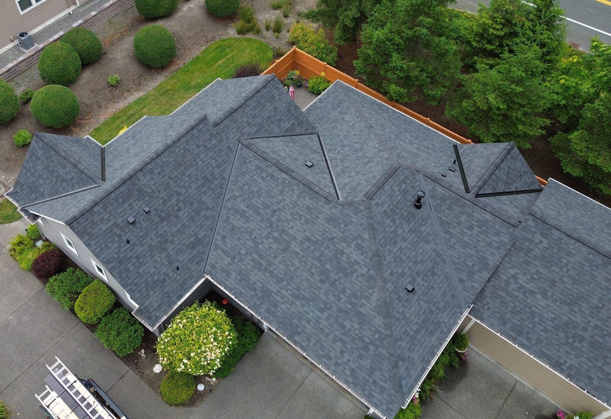 Drone view of the finished Malarkey Legacy Midnight Black asphalt shingle roof, Redmond, WA, by Amor Roofing