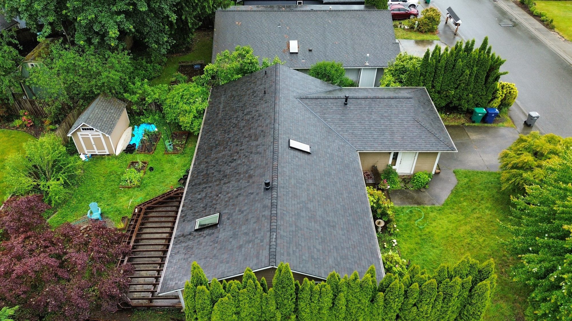 Amor Roofing Black Oak asphalt roof in Lake Stevens, drone front dormer