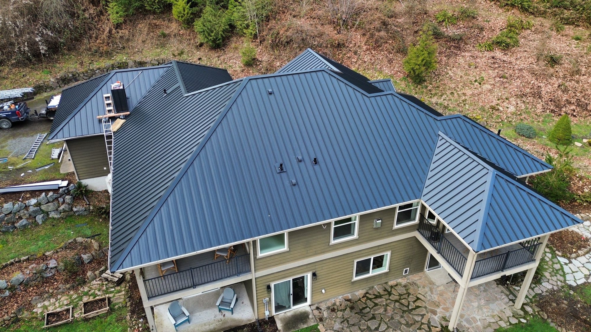 Amor Roofing Matte Black metal roof in Snohomish, full house standing seam drone