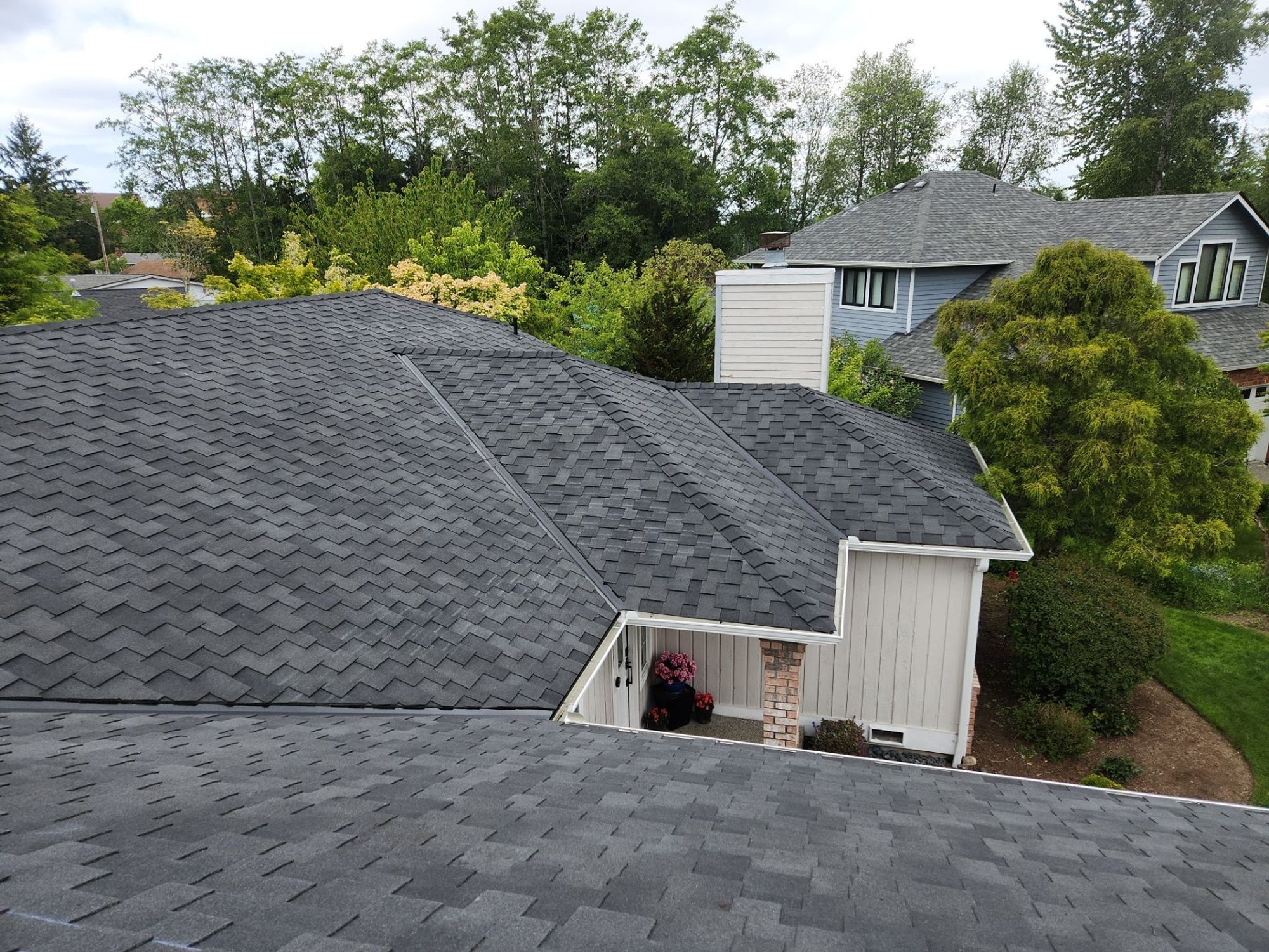 Finished Midnight Black designer shake roof looking toward the neighboring rooflines, Brier, WA