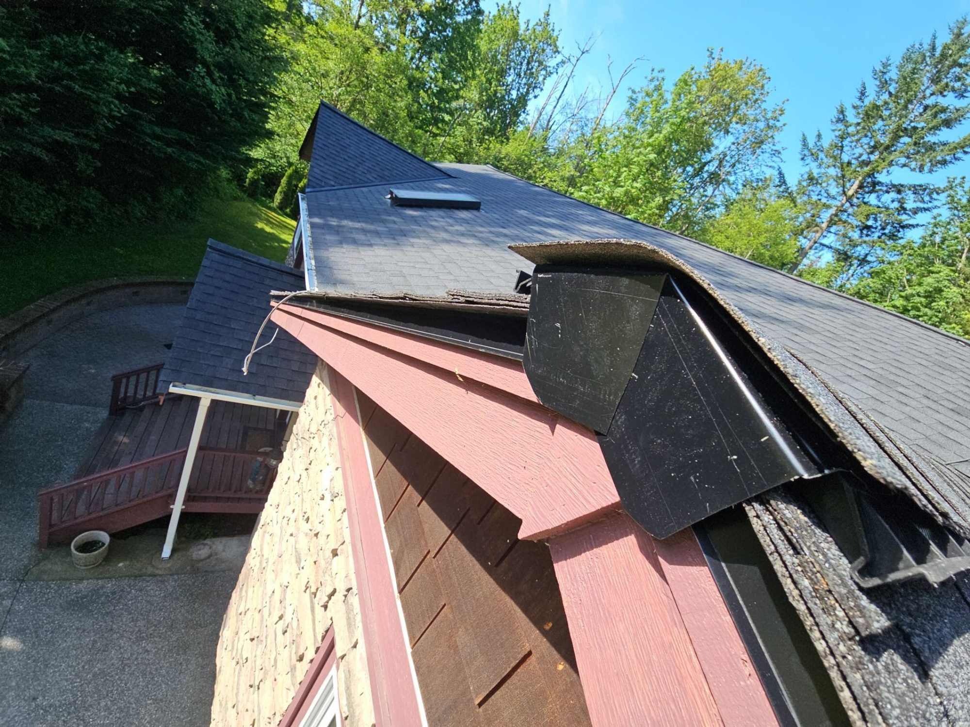 Dormer with new skylight on the finished Antique Black asphalt shingle roof, Tulalip Bay, WA