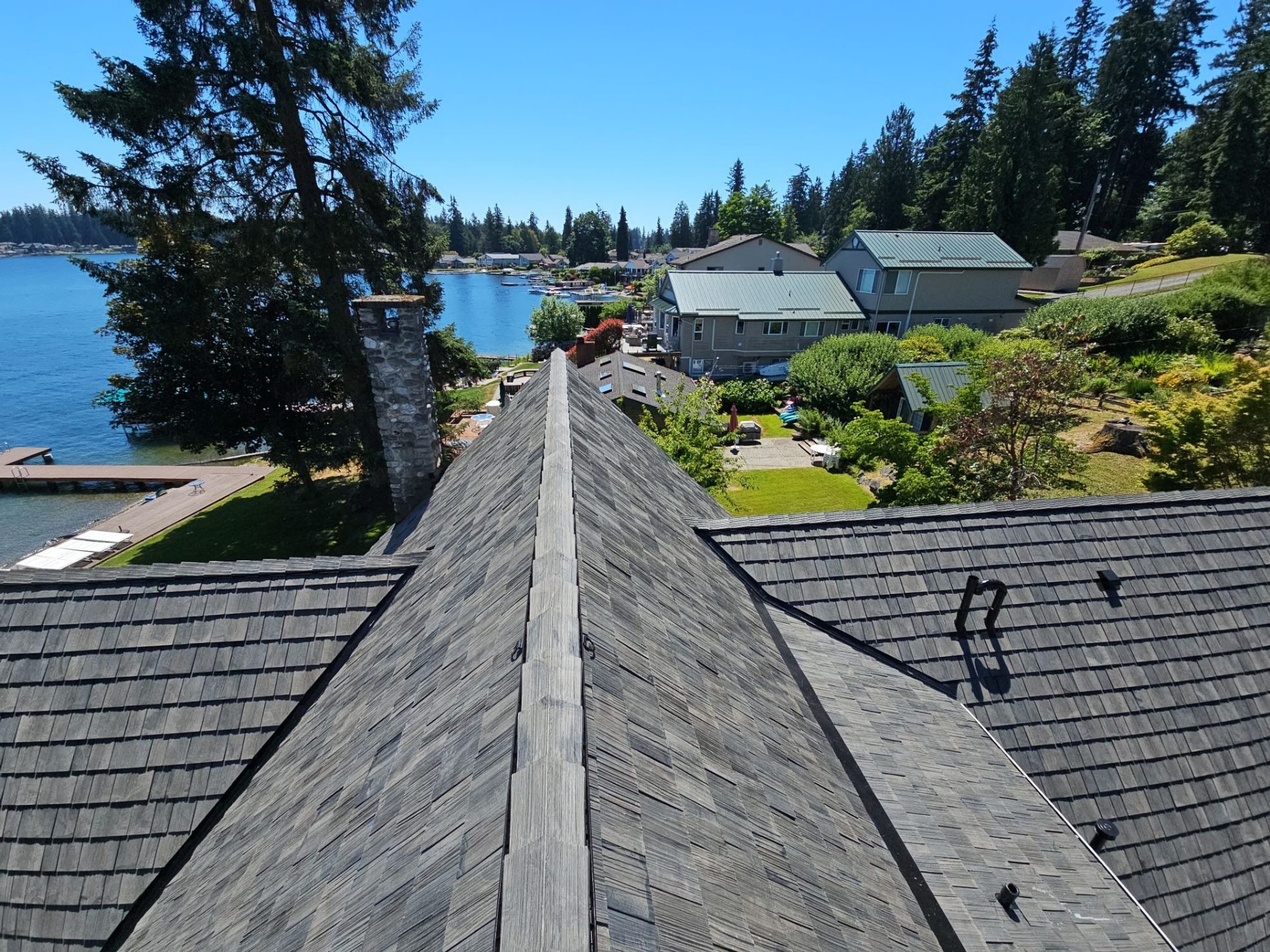 Amor Roofing Canyon Gray composite roof in Stanwood, after ridge lake view