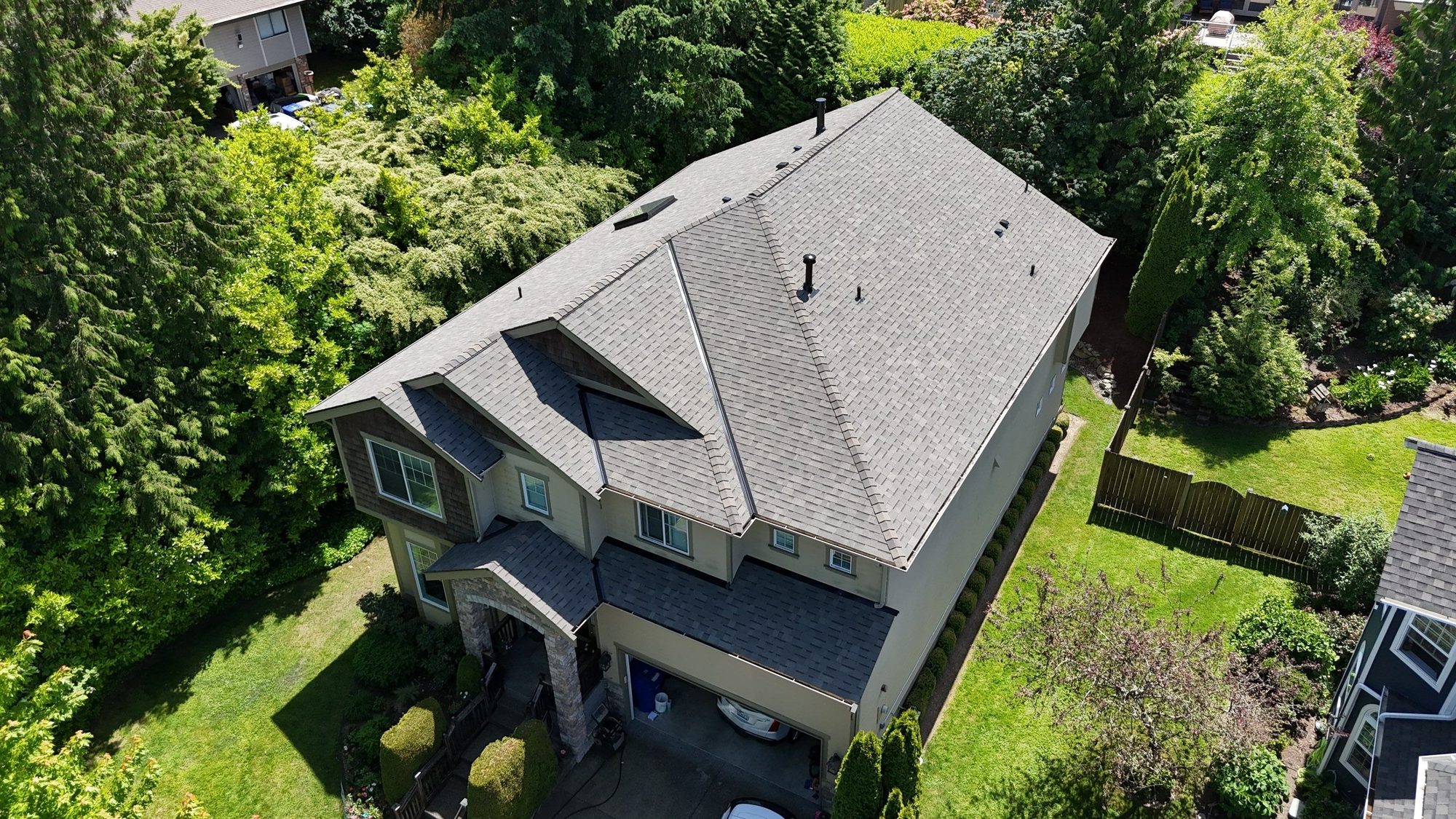 Amor Roofing Weathered Wood asphalt roof in Kenmore, drone rear three quarter