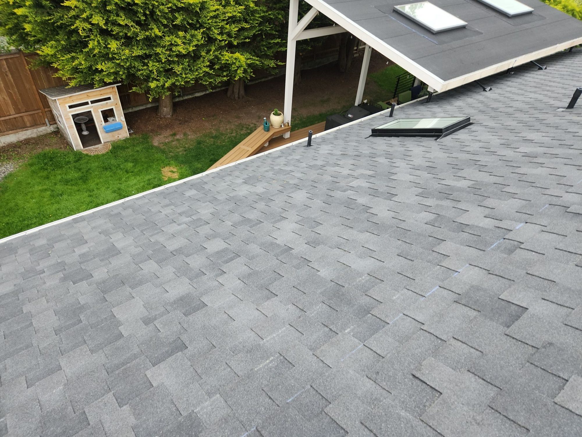 New skylights set into the finished Midnight Black designer shake roof, Brier, WA