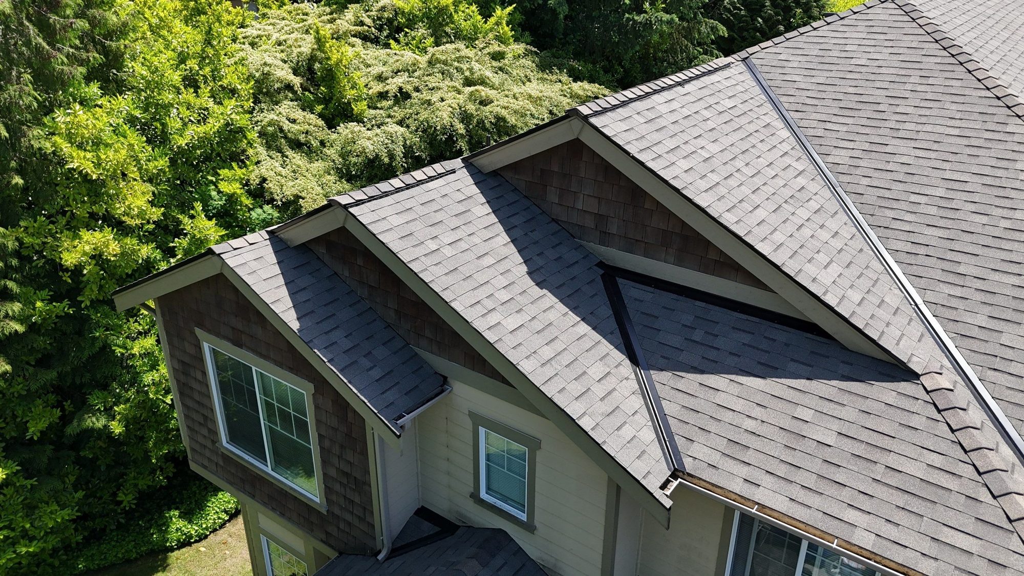 Drone view of the finished Malarkey Vista Weathered Wood asphalt shingle roof, Kenmore, WA, by Amor Roofing