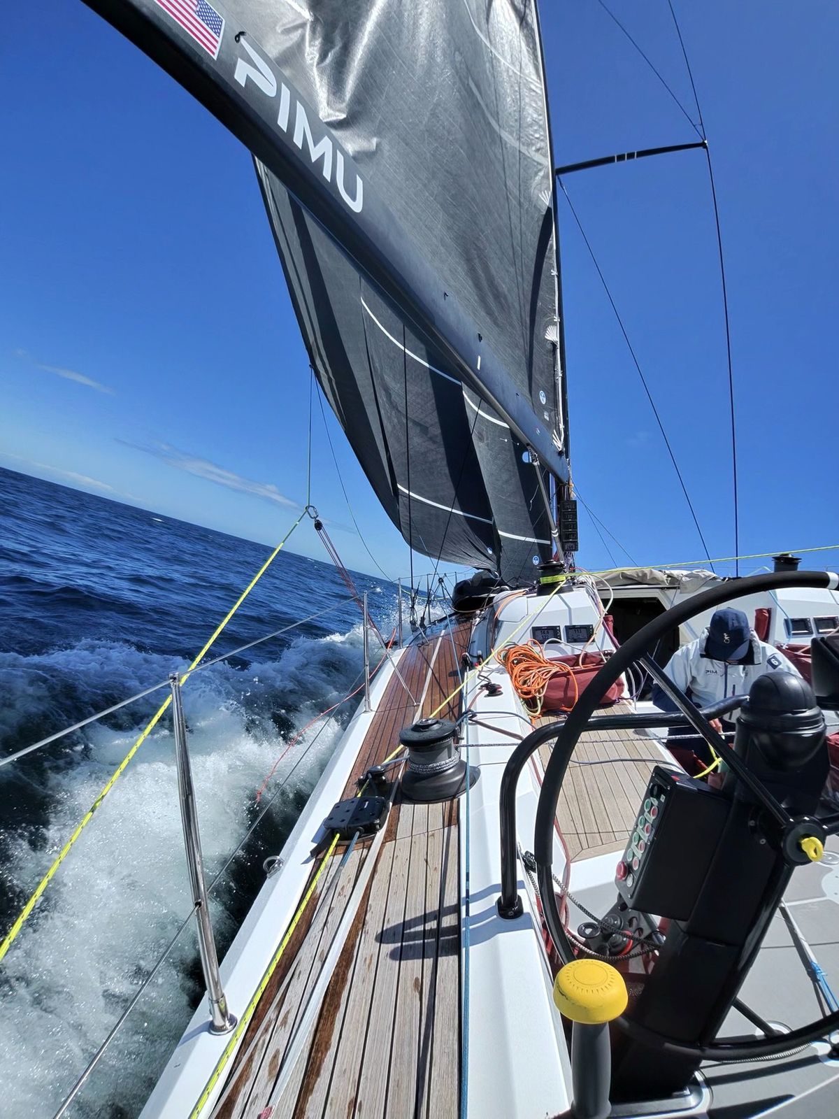 Cockpit and helm while reaching in swell