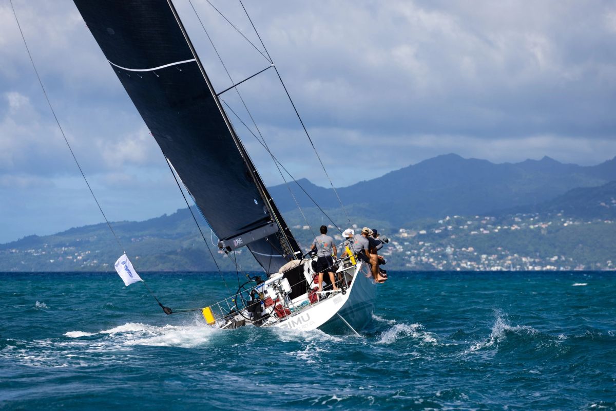 Pimu heeled hard with the hills of Grenada behind