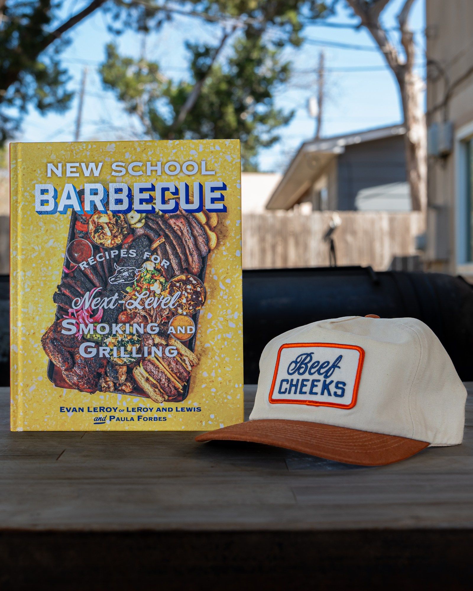 New School Barbecue beside the cream and burnt orange Beef Cheeks cap