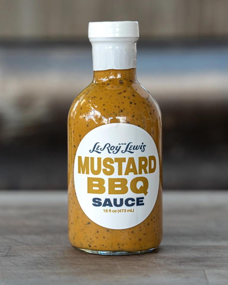 A 16 oz bottle of LeRoy and Lewis Mustard BBQ Sauce