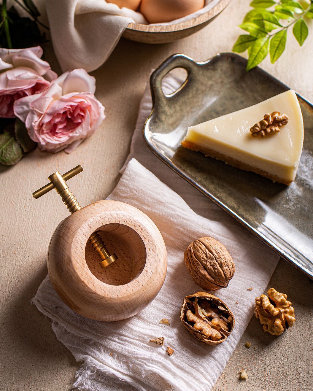 Brass pepper mill on a cheese board