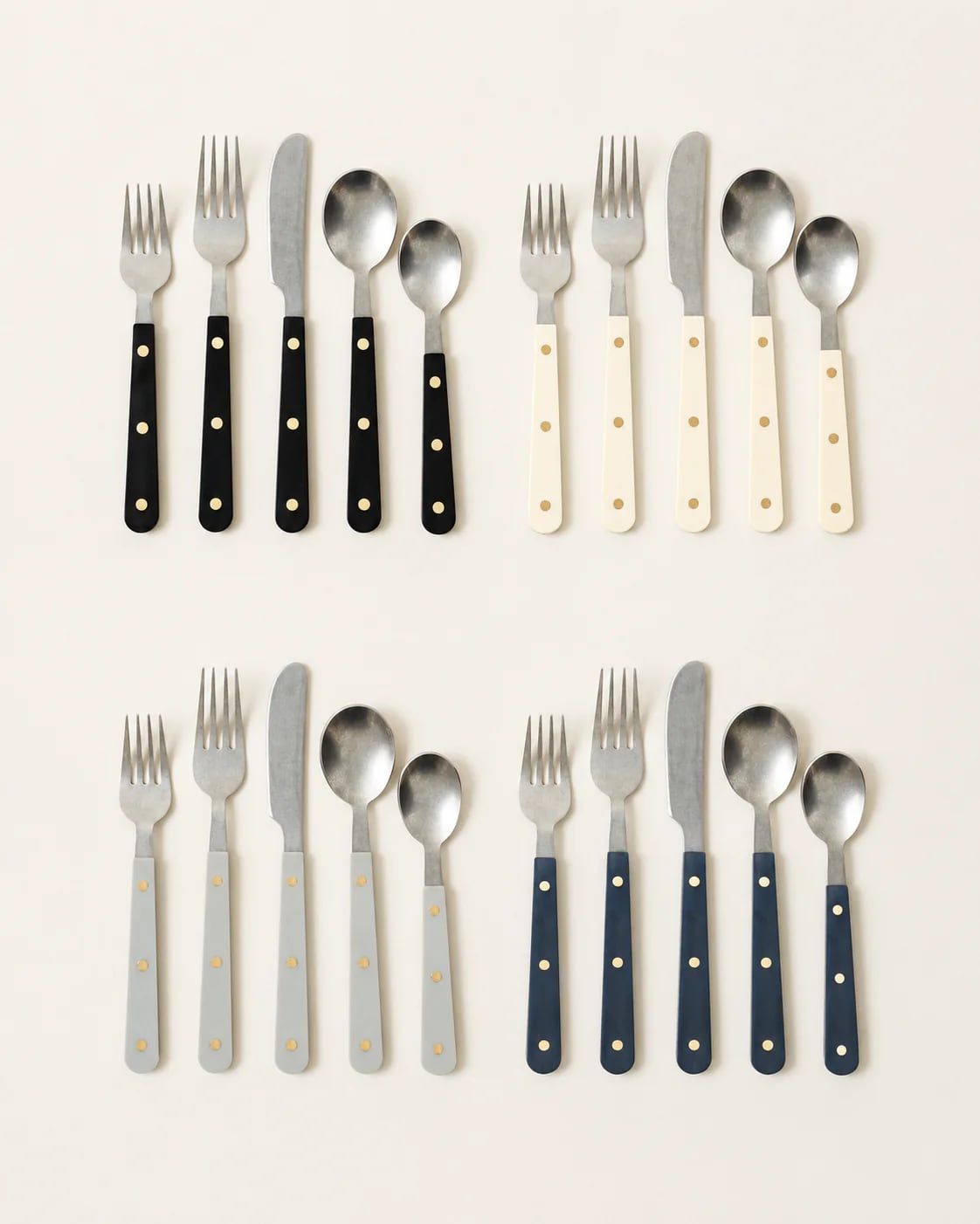 Mixed-metal flatware with hammered, beaded and inlaid handles