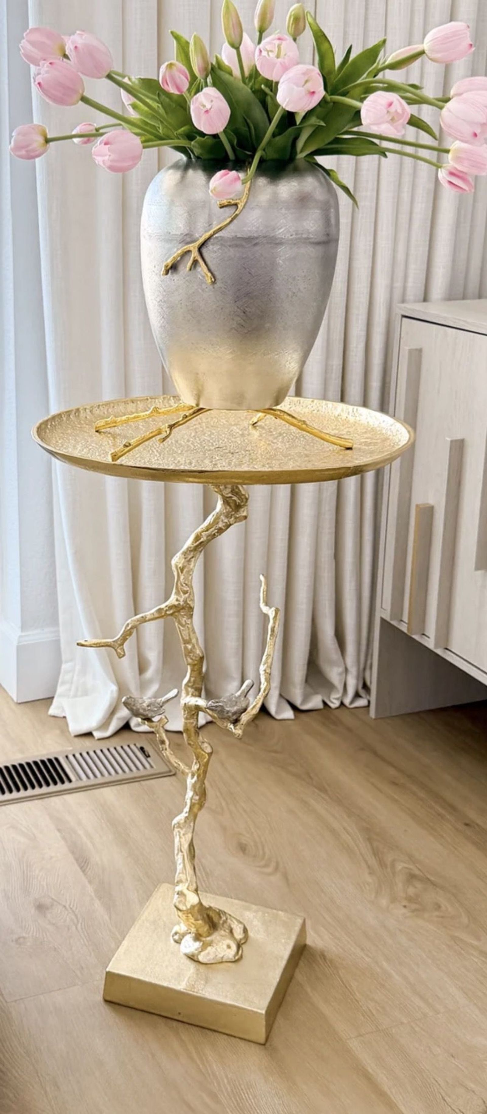 Gold accent side table with vase