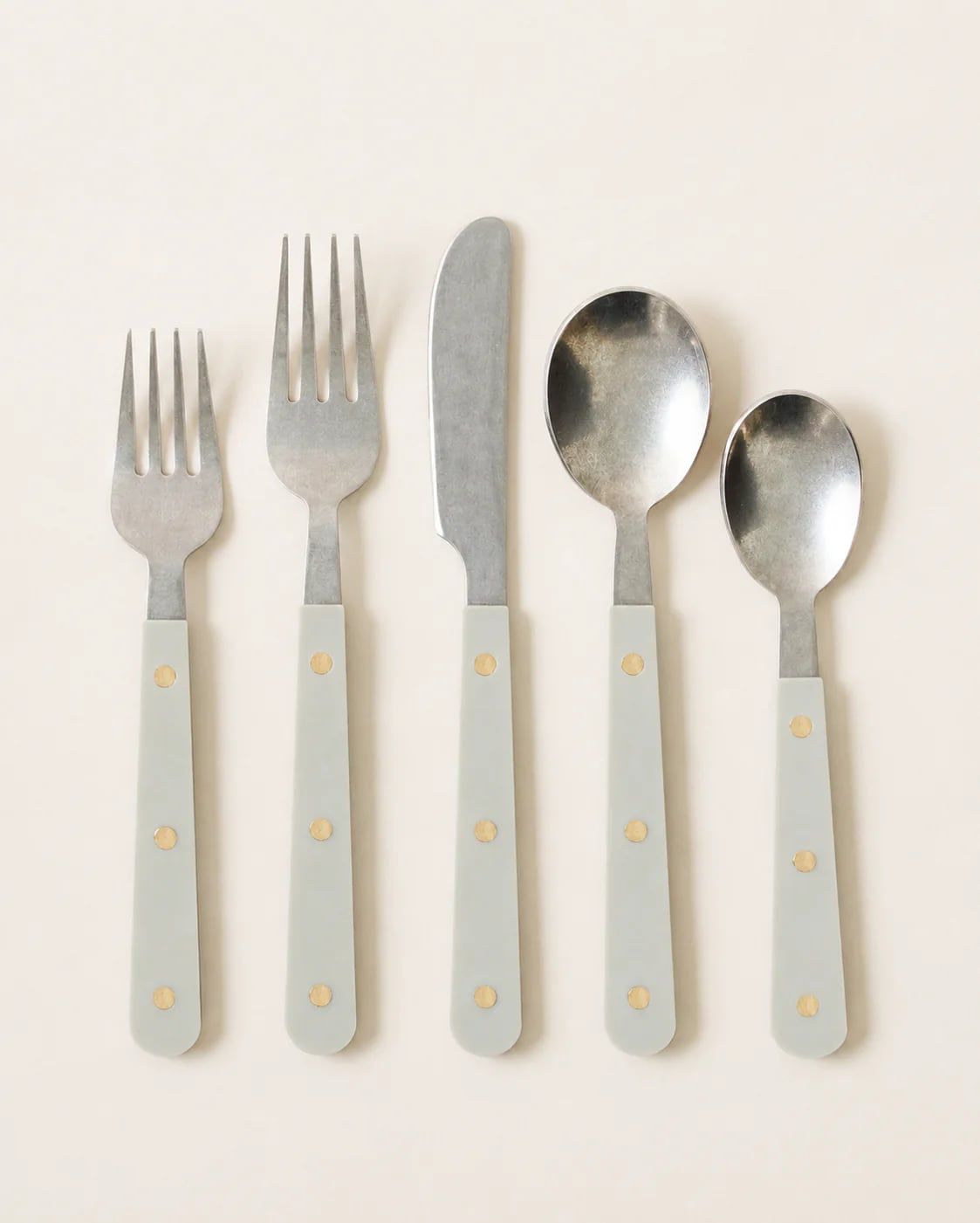 Mixed-metal flatware with hammered, beaded and inlaid handles