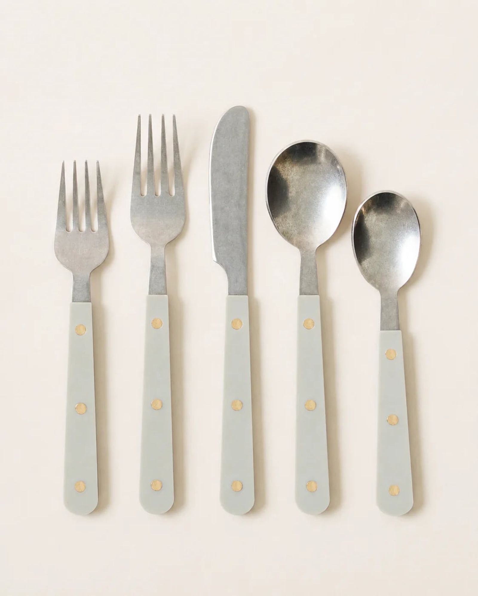Mixed-metal flatware with hammered, beaded and inlaid handles