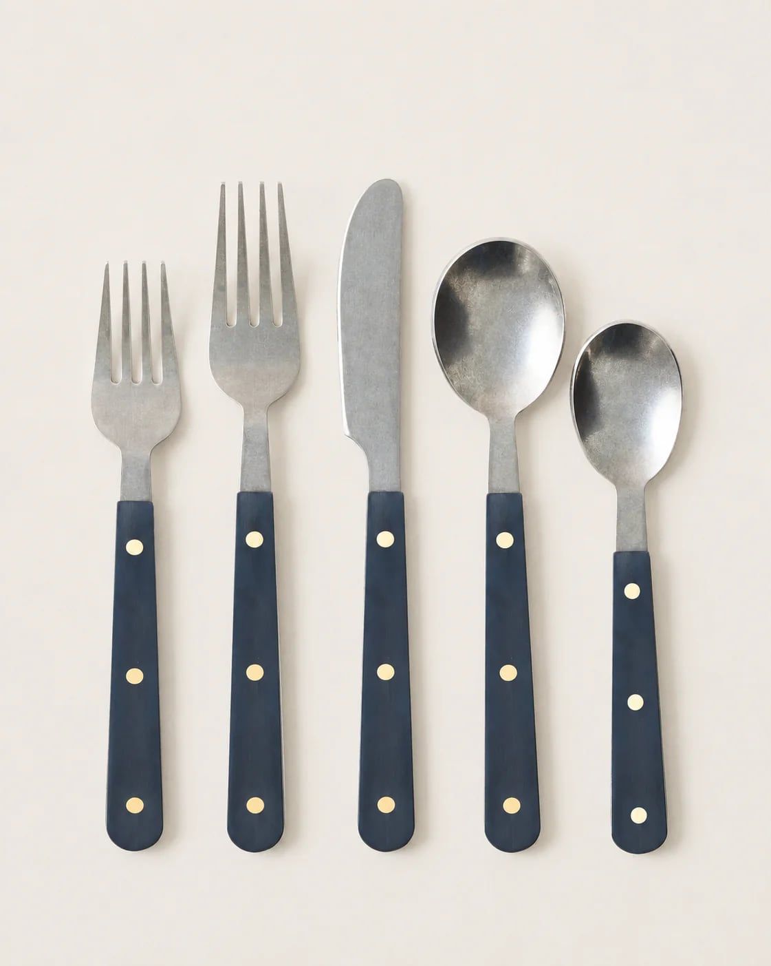 Mixed-metal flatware with hammered, beaded and inlaid handles